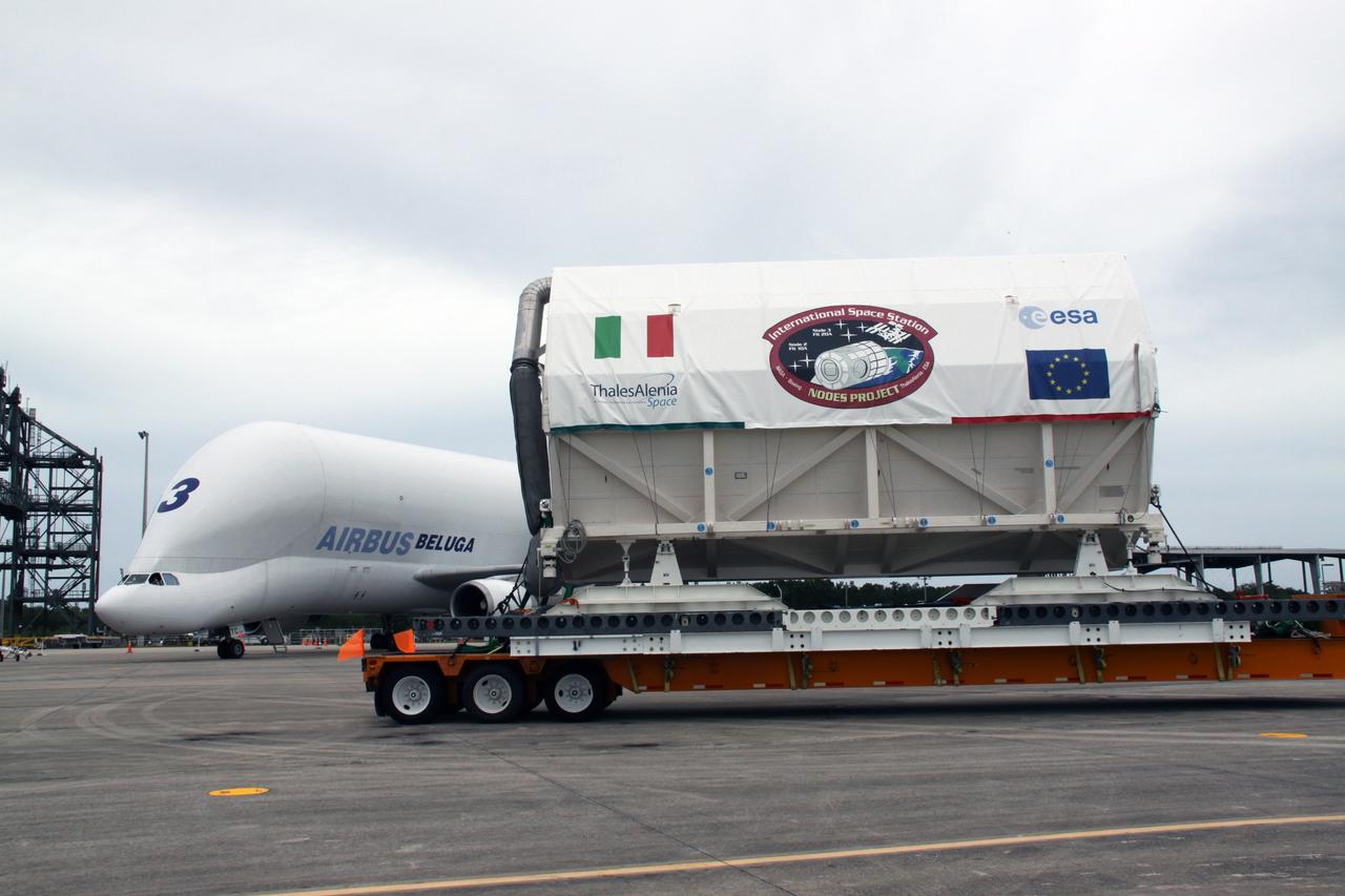 CAPE CANAVERAL, Fla. – At NASA's Kennedy Space Center in Florida, the flatbed trailer leaves the Shuttle Landing Facility with the Node 3 module. The module will be delivered to the Space Station Processing Facility. Named Tranquility, the module will be delivered to the International Space Station on the STS-130 mission. Tranquility will eventually house the life support equipment necessary for the space station's permanent crew of six. It will also accommodate the European Space Agency's Cupola observation module, a seven-window, dome-shaped structure. Tranquility is targeted for launch aboard space shuttle Endeavour in February 2010. Photo credit: NASA/Jack Pfaller