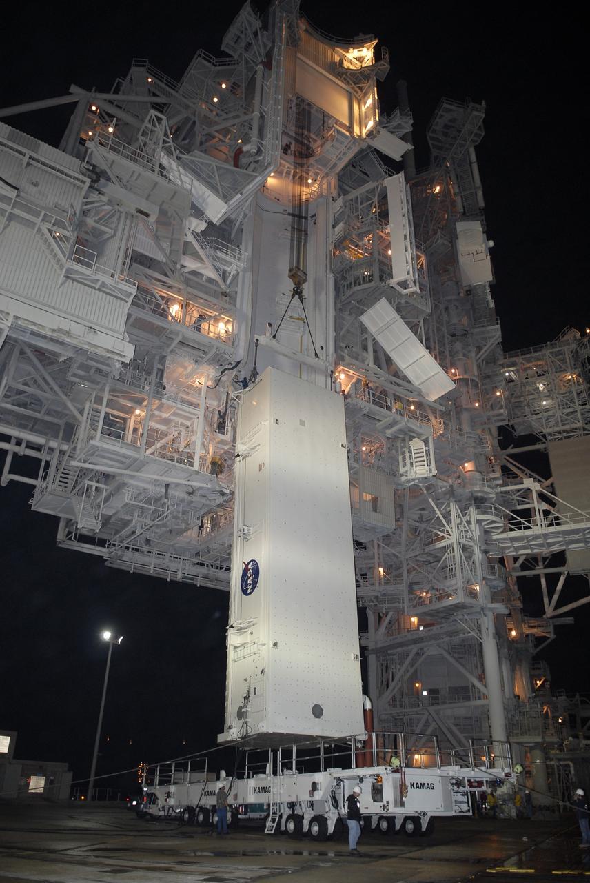 CAPE CANAVERAL, Fla. - At Launch Pad 39A at NASA's Kennedy Space Center in Florida, the canister containing the payload for space shuttle Endeavour’s STS-127 mission is lifted from its transporter toward the Payload Changeout Room. Endeavour’s rollaround from Pad 39B to Pad 39A is planned for May 30. The STS-127 payload includes the Japan Aerospace Exploration Agency's Kibo Exposed Facility and the Experiment Logistics Module Exposed Section of the International Space Station. They will be installed on the Kibo laboratory already on the station. Launch of the STS-127 mission is targeted for June 13.  Photo credit: NASA/Kim Shiflett