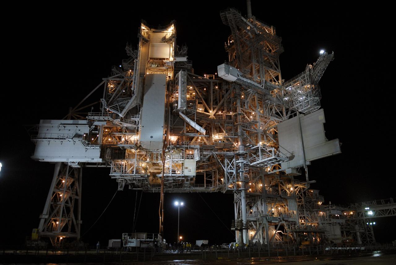 CAPE CANAVERAL, Fla. – At Launch Pad 39A at NASA's Kennedy Space Center in Florida, the canister containing the payload for space shuttle Endeavour’s STS-127 mission is lifted into the Payload Changeout Room, a fixture of the pad’s Rotating Service Structure. Endeavour’s rollaround from Pad 39B to Pad 39A is planned for May 30. The STS-127 payload includes the Japan Aerospace Exploration Agency's Kibo Exposed Facility and the Experiment Logistics Module Exposed Section of the International Space Station. They will be installed on the Kibo laboratory already on the station. Launch of the STS-127 mission is targeted for June 13.  Photo credit: NASA/Kim Shiflett