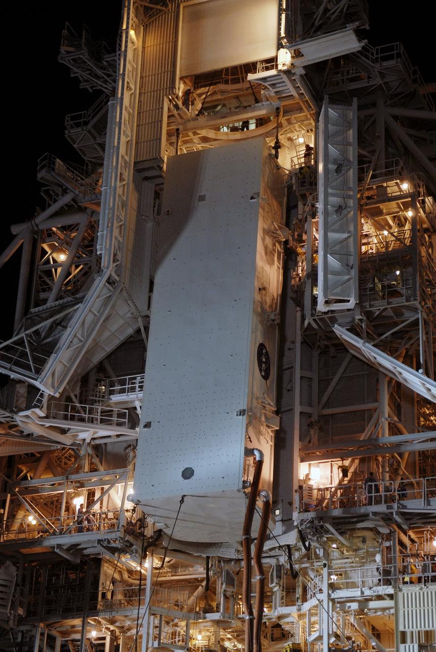 CAPE CANAVERAL, Fla. – At Launch Pad 39A at NASA's Kennedy Space Center in Florida, the canister containing the payload for space shuttle Endeavour’s STS-127 mission is positioned into the Payload Changeout Room, a fixture of the pad’s Rotating Service Structure. Endeavour’s rollaround from Pad 39B to Pad 39A is planned for May 30. The STS-127 payload includes the Japan Aerospace Exploration Agency's Kibo Exposed Facility and the Experiment Logistics Module Exposed Section of the International Space Station. They will be installed on the Kibo laboratory already on the station. Launch of the STS-127 mission is targeted for June 13.  Photo credit: NASA/Kim Shiflett