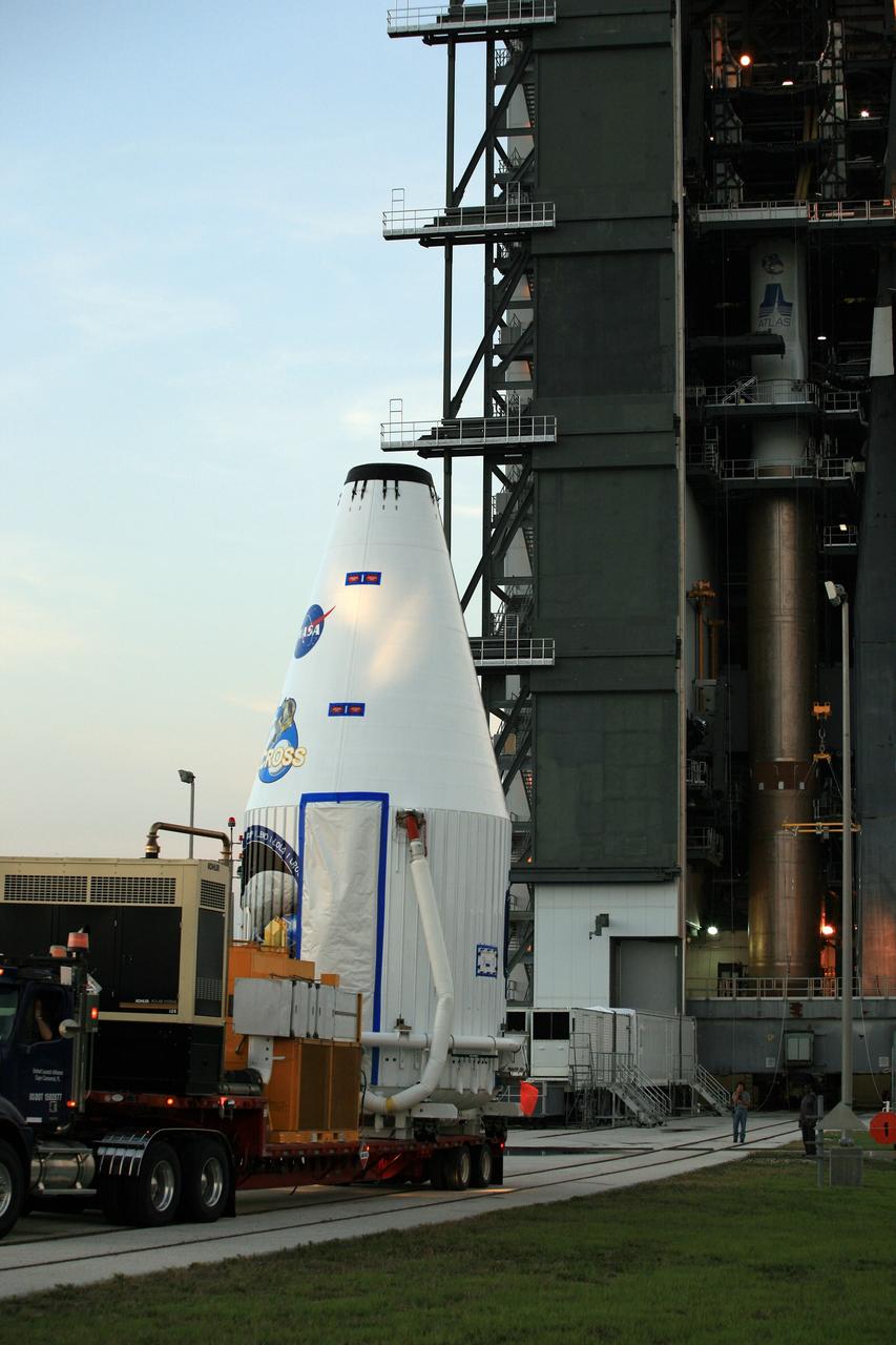 CAPE CANAVERAL, Fla. – The Lunar Reconnaissance Orbiter, or LRO, and NASA's Lunar Crater Observation and Sensing Satellite, known as LCROSS, are moved closer to the mobile service tower on Launch Complex 41 at Cape Canaveral Air Force Station in Florida.  The LRO includes five instruments that will help NASA characterize the moon's surface:  DIVINER, LAMP, LEND, LOLA and LROC.  Along with LCROSS, they will be launched aboard an Atlas V/Centaur rocket on June 17. Photo credit: NASA/Dimitri Gerondidakis