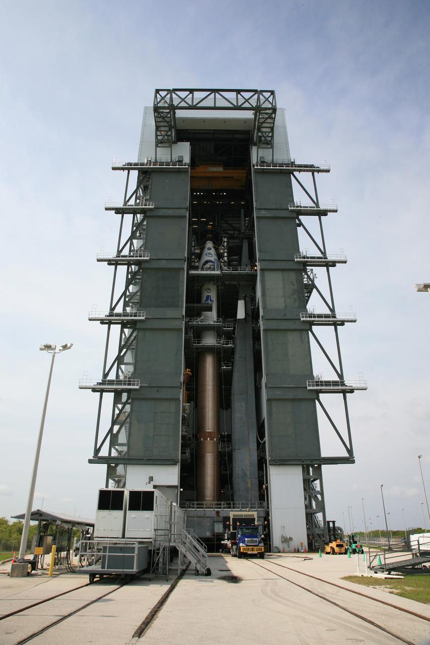 CAPE CANAVERAL, Fla. – On Launch Complex 41 at Cape Canaveral Air Force Station in Florida, the Lunar Reconnaissance Orbiter, or LRO, and NASA's Lunar Crater Observation and Sensing Satellite, known as LCROSS, are mated with the Atlas V rocket inside the mobile service tower for launch. The LRO includes five instruments that will help NASA characterize the moon's surface:  DIVINER, LAMP, LEND, LOLA and LROC.  Along with LCROSS, they will be launched aboard an Atlas V/Centaur rocket on June 17. Photo credit: NASA/Dimitri Gerondidakis