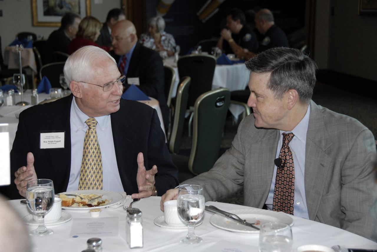 CAPE CANAVERAL, Fla. – Florida Rep. Ralph Poppell (left) talks with Kennedy Space Center Director Bob Cabana during the annual Community Leaders Breakfast held in the Debus Center at Kennedy Space Center's Visitor Complex. Community leaders, business executives, educators, community organizers and state and local government heard Cabana provide an overview of operations at the space center and a look ahead at upcoming missions and activities. Photo credit: NASA/Kim Shiflett