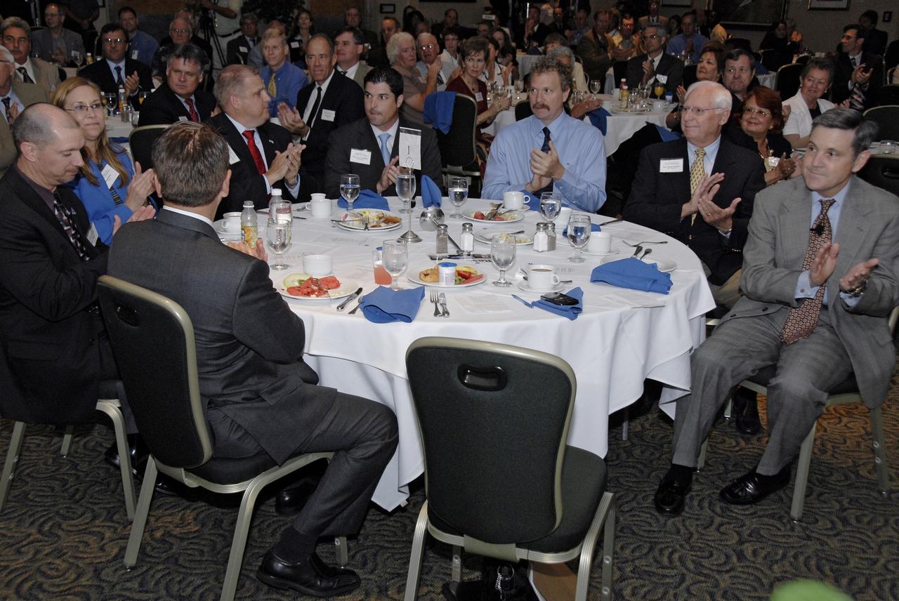 CAPE CANAVERAL, Fla. – Introductions are made at the annual Community Leaders Breakfast held in the Debus Center at Kennedy Space Center's Visitor Complex. Seated at far right are Center Director Bob Cabana and, on the left, Florida Rep. Ralph Poppell.  Community leaders, business executives, educators, community organizers and state and local government heard Cabana provide an overview of operations at the space center and a look ahead at upcoming missions and activities. Photo credit: NASA/Kim Shiflett