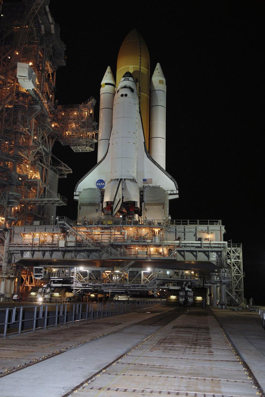 CAPE CANAVERAL, Fla. – At NASA's Kennedy Space Center in Florida, space shuttle Endeavour, the last orbiter to join the shuttle fleet, begins rolling off Launch Pad 39B for the 3.4-mile rollaround to Launch Pad 39A. First motion was at 3:16 a.m. EDT.  Endeavour was on standby on Pad 39B to be used in the unlikely event that a rescue mission was necessary during space shuttle Atlantis' STS-125 mission to NASA's Hubble Space Telescope. The payload on the STS-127 mission includes the Japan Aerospace Exploration Agency's Kibo Exposed Facility and the Experiment Logistics Module Exposed Section of the International Space Station. They will be installed on the Kibo laboratory already on the station. Launch of STS-127 is targeted for June 13. Photo credit: NASA/Kim Shiflett