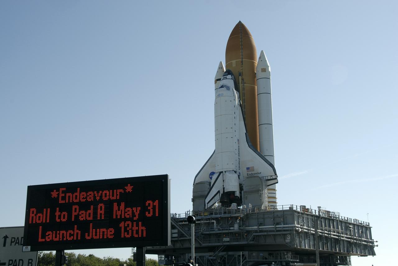 CAPE CANAVERAL, Fla. – A sign announces processing activities in progress at NASA's Kennedy Space Center in Florida. Space shuttle Endeavour is well on its way from Launch Pad 39B to Launch Pad 39A.  First motion of the 3.4-mile rollaround was at 3:16 a.m. EDT.  Endeavour was on standby on Pad 39B to be used in the unlikely event that a rescue mission was necessary during space shuttle Atlantis' STS-125 mission to NASA's Hubble Space Telescope. The payload on the STS-127 mission includes the Japan Aerospace Exploration Agency's Kibo Exposed Facility and the Experiment Logistics Module Exposed Section of the International Space Station. They will be installed on the Kibo laboratory already on the station. Launch of STS-127 is targeted for June 13. Photo credit: NASA/Kim Shiflett