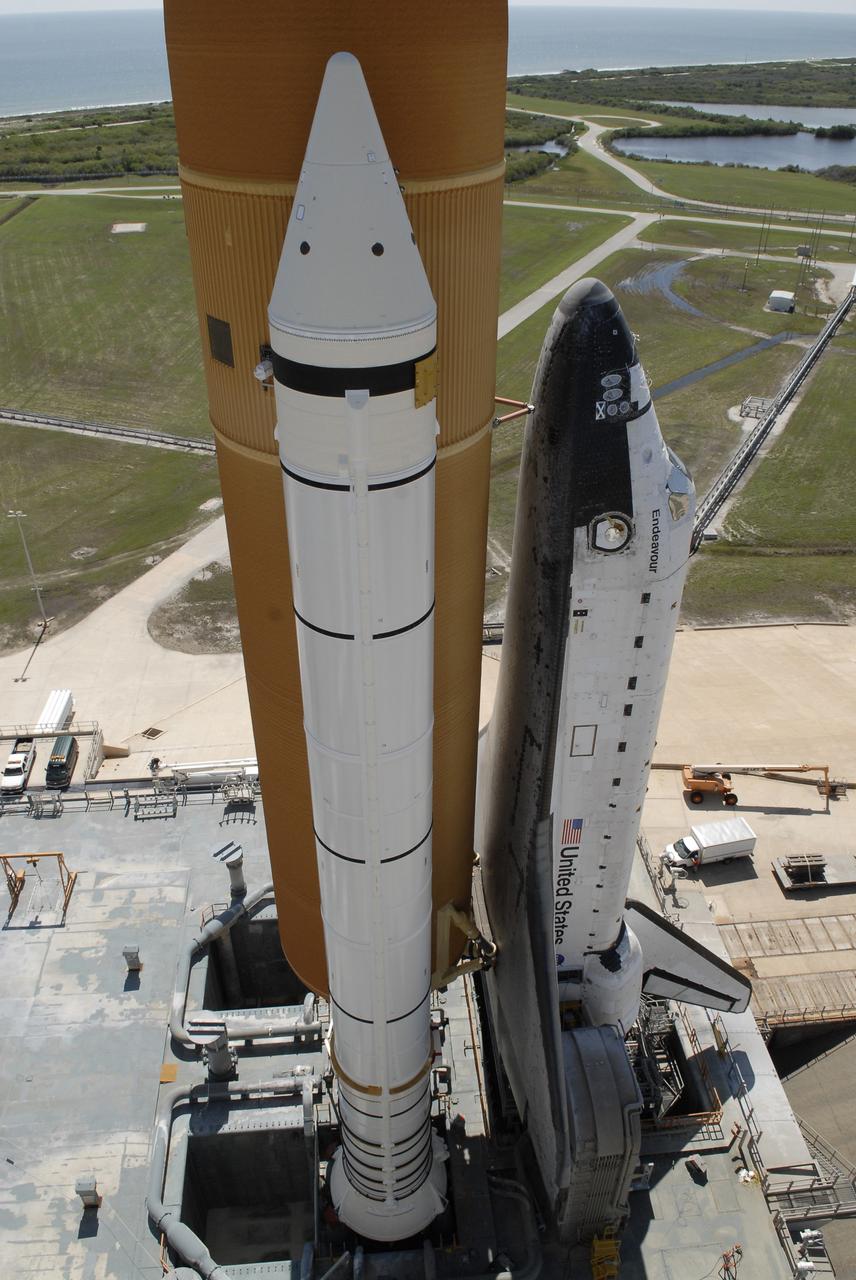 CAPE CANAVERAL, Fla. – At NASA's Kennedy Space Center in Florida, space shuttle Endeavour nears the end of its 3.4-mile trek from Launch Pad 39B to Launch Pad 39A.   First motion of the rollaround from Launch Pad 39B was at 3:16 a.m. EDT, and the shuttle was secured to Launch Pad 39A at 11:42 a.m. EDT. Endeavour was on standby on Pad 39B to be used in the unlikely event that a rescue mission was necessary during space shuttle Atlantis' STS-125 mission to NASA's Hubble Space Telescope. The payload on Endeavour's next mission, STS-127, includes the Japan Aerospace Exploration Agency's Kibo Exposed Facility and the Experiment Logistics Module Exposed Section of the International Space Station. They will be installed on the Kibo laboratory already on the station. Launch of STS-127 is targeted for June 13. Photo credit: NASA/Kim Shiflett