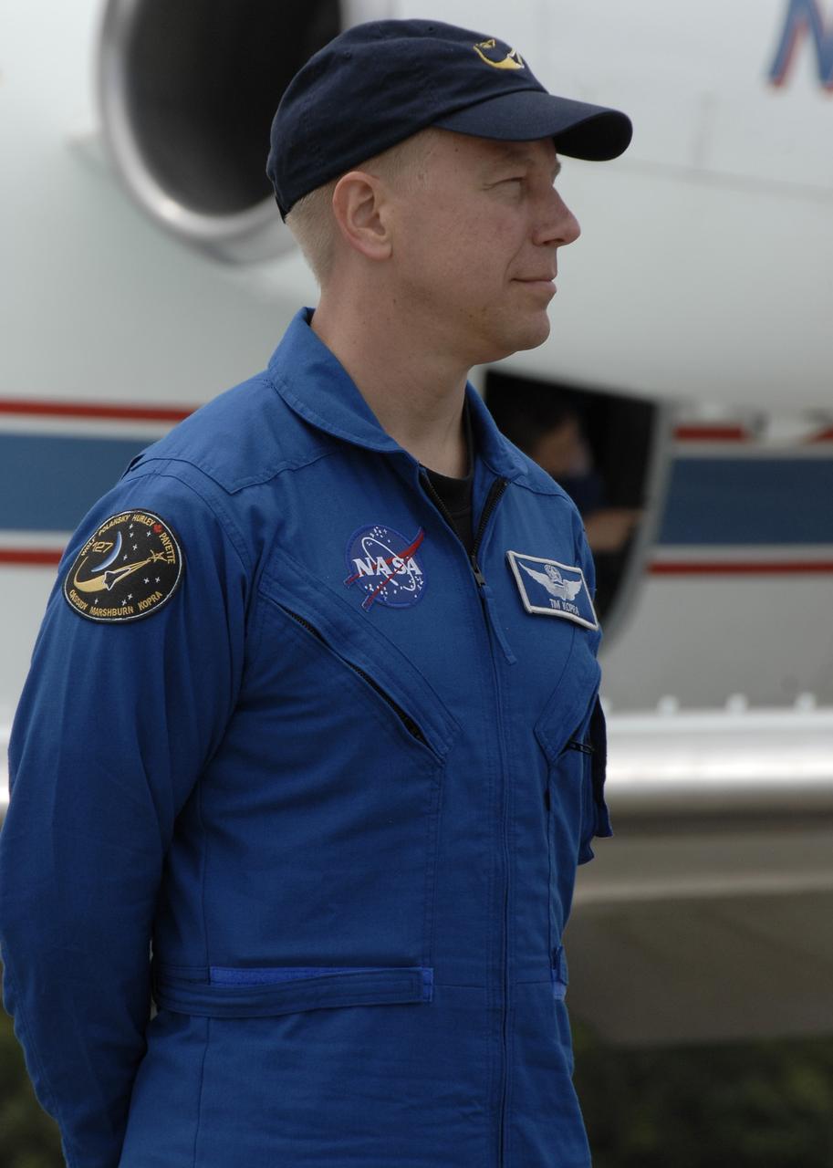CAPE CANAVERAL, Fla. – Space shuttle Endeavour's STS-127 mission crew members greet the media after arriving at NASA's Kennedy Space Center in Florida for the Terminal Countdown Demonstration Test, or TCDT. Seen here is Mission Specialist Tim Kopra. The astronauts will be taking part in Terminal Countdown Demonstration Test activities that include equipment familiarization and emergency egress training, and culminates in a simulated launch countdown aboard Endeavour. The STS-127 mission is the final of three flights dedicated to the assembly of the Japanese Kibo laboratory complex. Launch is targeted for June 13. Photo credit: NASA/Kim Shiflett