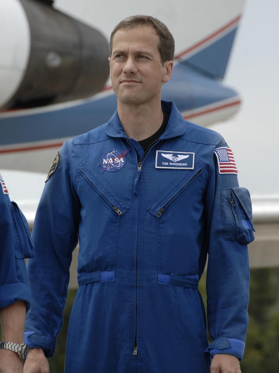 CAPE CANAVERAL, Fla. – Space shuttle Endeavour's STS-127 mission crew members greet the media after arriving at NASA's Kennedy Space Center in Florida for the Terminal Countdown Demonstration Test, or TCDT. Seen here is Mission Specialist Tom Marshburn. The astronauts will be taking part in Terminal Countdown Demonstration Test activities that include equipment familiarization and emergency egress training, and culminates in a simulated launch countdown aboard Endeavour. The STS-127 mission is the final of three flights dedicated to the assembly of the Japanese Kibo laboratory complex. Launch is targeted for June 13. Photo credit: NASA/Kim Shiflett