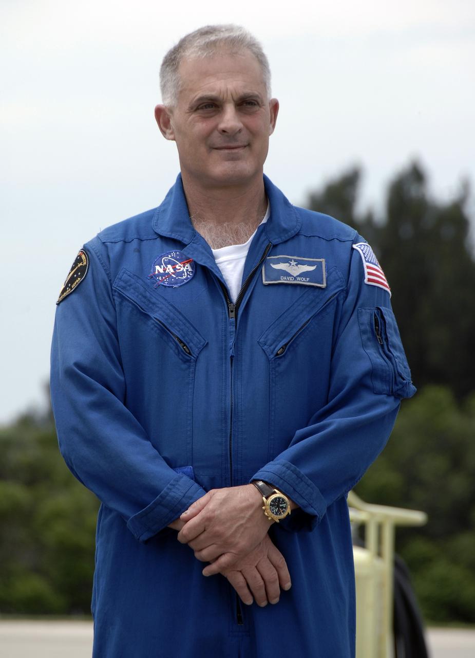 CAPE CANAVERAL, Fla. – Space shuttle Endeavour's STS-127 mission crew members greet the media after arriving at NASA's Kennedy Space Center in Florida for the Terminal Countdown Demonstration Test, or TCDT. Seen here is Mission Specialist Dave Wolf. The astronauts will be taking part in Terminal Countdown Demonstration Test activities that include equipment familiarization and emergency egress training, and culminates in a simulated launch countdown aboard Endeavour. The STS-127 mission is the final of three flights dedicated to the assembly of the Japanese Kibo laboratory complex. Launch is targeted for June 13. Photo credit: NASA/Kim Shiflett