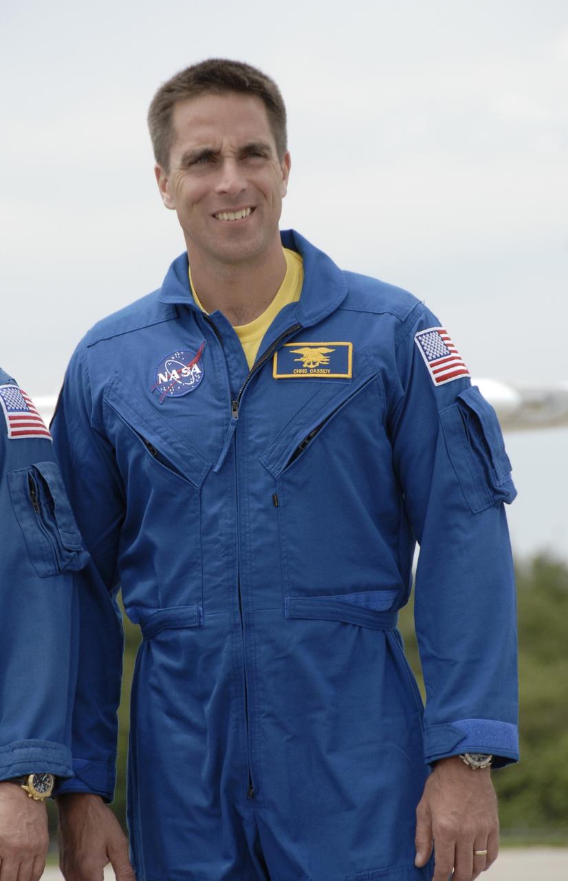 CAPE CANAVERAL, Fla. – Space shuttle Endeavour's STS-127 mission crew members greet the media after arriving at NASA's Kennedy Space Center in Florida for the Terminal Countdown Demonstration Test, or TCDT. Seen here is Mission Specialist Chris Cassidy. The astronauts will be taking part in Terminal Countdown Demonstration Test activities that include equipment familiarization and emergency egress training, and culminates in a simulated launch countdown aboard Endeavour. The STS-127 mission is the final of three flights dedicated to the assembly of the Japanese Kibo laboratory complex. Launch is targeted for June 13. Photo credit: NASA/Kim Shiflett