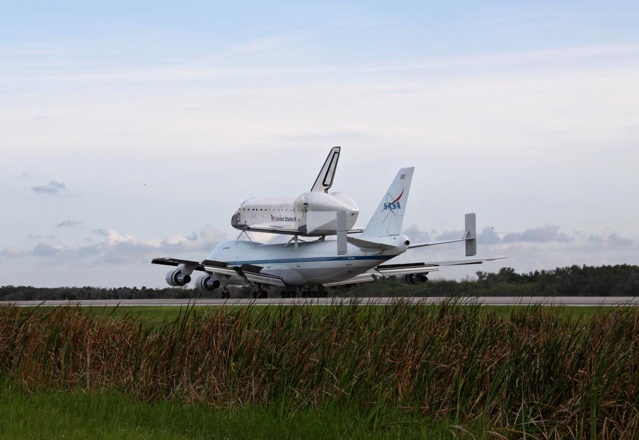 CAPE CANAVERAL, Fla. – After a two-day trip from California, space shuttle Atlantis returns home to NASA's Kennedy Space Center secured atop a Shuttle Carrier Aircraft, or SCA. Touchdown on runway 15 at Kennedy's Shuttle Landing Facility was at 6:53 p.m. EDT. The SCA is a modified Boeing 747 jetliner. Atlantis returned from California atop the SCA after its May 24 landing at Edwards Air Force Base, concluding mission STS-125. The ferry flight from Edwards Air Force Base began June 1. Atlantis' next assignment is the STS-129 mission, targeted to launch in November 2009. Photo credit: NASA/Jack Pfaller