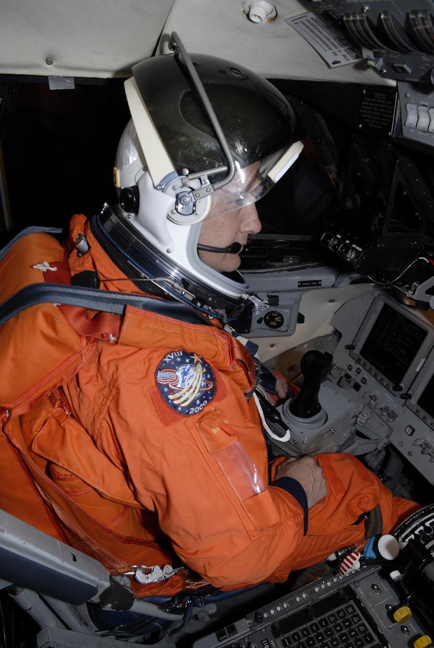 CAPE CANAVERAL, Fla. –  On the Shuttle Landing Facility at NASA's Kennedy Space Center in Florida, STS-127 Pilot Doug Hurley is wearing his complete launch-and-entry suit in the cockpit of the Shuttle Training Aircraft. He is preparing to practice shuttle landings in preparation for launch of space shuttle Endeavour on the STS-127 mission, targeted for June 13.  The STA is a Grumman American Aviation-built Gulf Stream II jet that was modified to simulate a shuttle’s cockpit, motion and visual cues, and handling qualities. The crew is at Kennedy for a launch dress rehearsal called the terminal countdown demonstration test, or TCDT, which includes emergency egress training and equipment familiarization. The STS-127 mission is the final of three flights dedicated to the assembly of the Japanese Kibo laboratory complex on the International Space Station. It is the 127th shuttle flight  and the 29th in the assembly of the space station.  Photo credit: NASA/Kim Shiflett