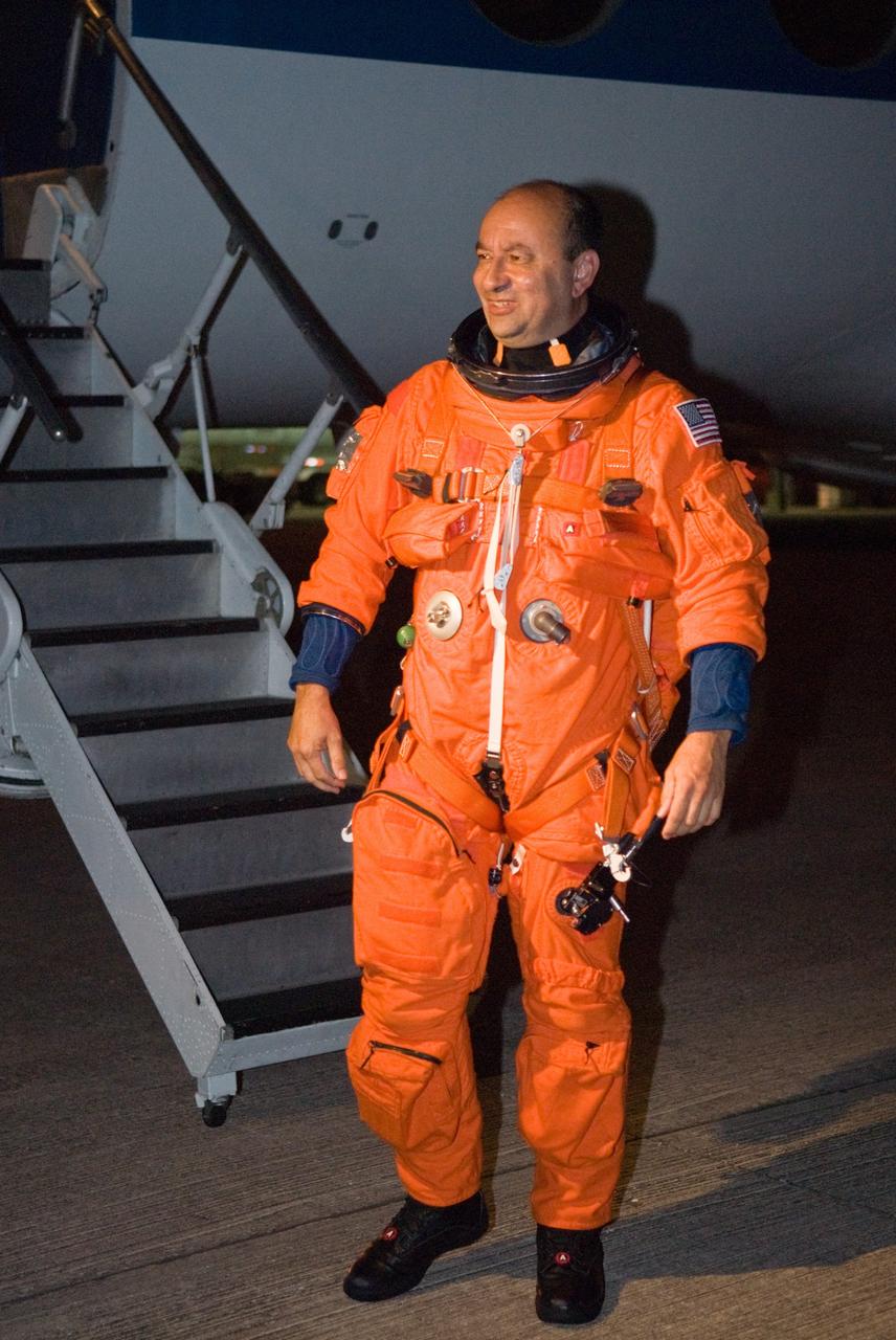 CAPE CANAVERAL, Fla. –  On the Shuttle Landing Facility at NASA's Kennedy Space Center in Florida, STS-127 Commander Mark Polansky exits the Shuttle Training Aircraft.  He and Pilot Doug Hurley have been practicing shuttle landings in preparation for launch of space shuttle Endeavour on the STS-127 mission, targeted for June 13.  The STA is a Grumman American Aviation-built Gulf Stream II jet that was modified to simulate a shuttle’s cockpit, motion and visual cues, and handling qualities. The crew is at Kennedy for a launch dress rehearsal called the terminal countdown demonstration test, or TCDT, which includes emergency egress training and equipment familiarization. The STS-127 mission is the final of three flights dedicated to the assembly of the Japanese Kibo laboratory complex on the International Space Station. It is the 127th shuttle flight  and the 29th in the assembly of the space station.  Photo credit: NASA/Kim Shiflett