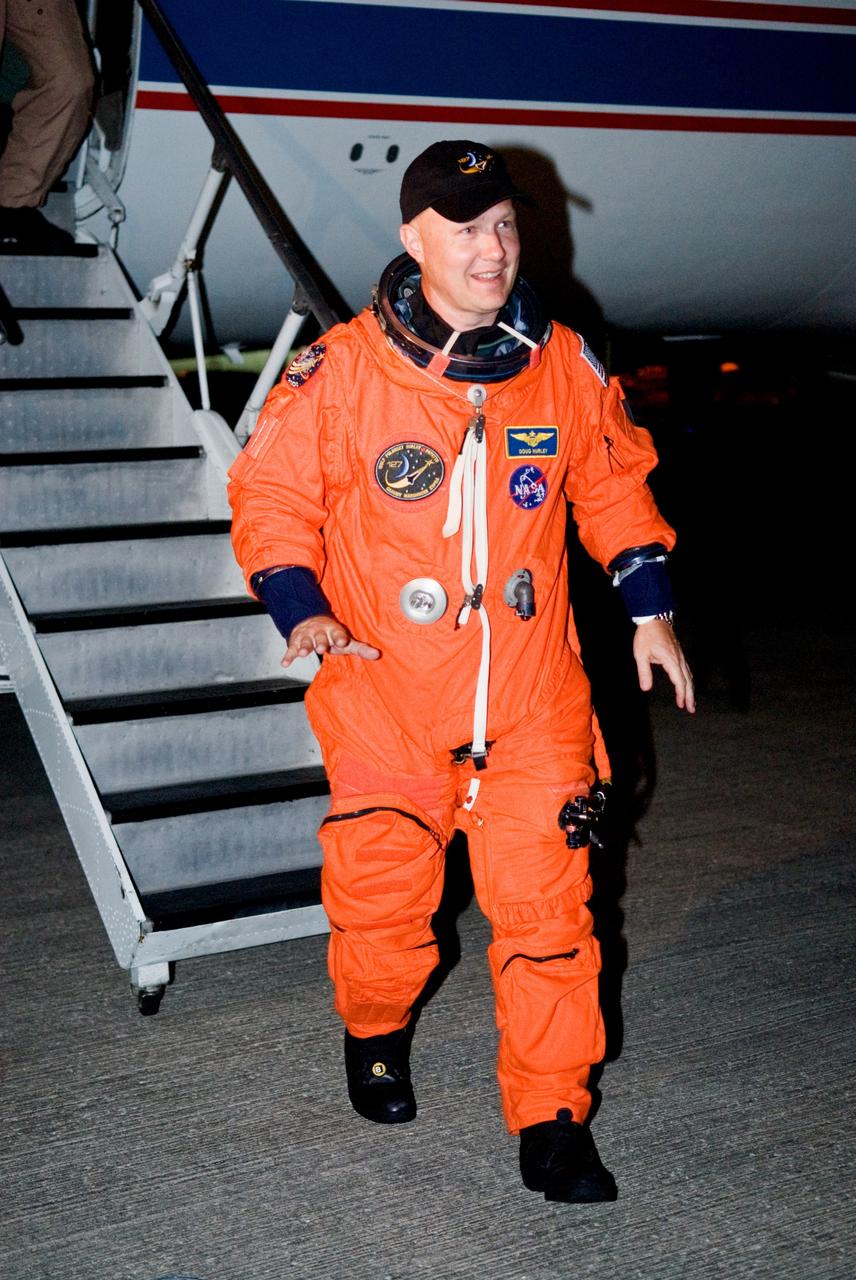CAPE CANAVERAL, Fla. –  On the Shuttle Landing Facility at NASA's Kennedy Space Center in Florida, STS-127 Pilot Doug Hurley exits the Shuttle Training Aircraft.  He and Commander Mark Polansky have been practicing shuttle landings in preparation for launch of space shuttle Endeavour on the STS-127 mission, targeted for June 13.  The STA is a Grumman American Aviation-built Gulf Stream II jet that was modified to simulate a shuttle’s cockpit, motion and visual cues, and handling qualities. The crew is at Kennedy for a launch dress rehearsal called the terminal countdown demonstration test, or TCDT, which includes emergency egress training and equipment familiarization. The STS-127 mission is the final of three flights dedicated to the assembly of the Japanese Kibo laboratory complex on the International Space Station. It is the 127th shuttle flight  and the 29th in the assembly of the space station.  Photo credit: NASA/Kim Shiflett