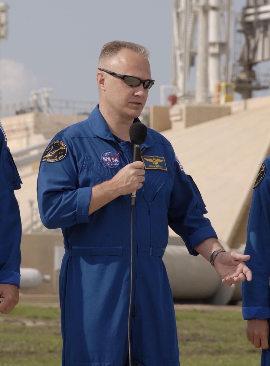 CAPE CANAVERAL, Fla. –  STS-127 Pilot Doug Hurley answers a question from the media during a session with the media at NASA Kennedy Space Center's Launch Pad 39A.  The crew is at Kennedy for a launch dress rehearsal called the terminal countdown demonstration test, or TCDT, which includes emergency egress training and equipment familiarization.  Space shuttle Endeavour's STS-127 mission is the final of three flights dedicated to the assembly of the Japanese Kibo laboratory complex on the International Space Station.  Endeavour's launch is targeted for June 13.    Photo credit: NASA/Kim Shiflett