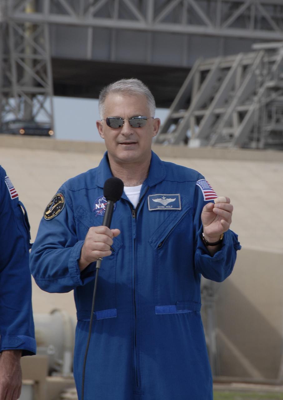CAPE CANAVERAL, Fla. –  STS-127 Mission Specialist Dave Wolf answers a question during a session with the media at NASA Kennedy Space Center's Launch Pad 39A.  The crew is at Kennedy for a launch dress rehearsal called the terminal countdown demonstration test, or TCDT, which includes emergency egress training and equipment familiarization.  Space shuttle Endeavour's STS-127 mission is the final of three flights dedicated to the assembly of the Japanese Kibo laboratory complex on the International Space Station.  Endeavour's launch is targeted for June 13.    Photo credit: NASA/Kim Shiflett