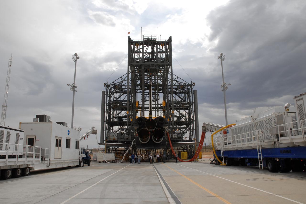 CAPE CANAVERAL, Fla. – Under the mate/demate device at Edwards Air Force Base in California, Atlantis is fitted with a sling to lift it for attachment to the Shuttle Carrier Aircraft, or SCA, a modified Boeing 747.   Atlantis landed at Edwards on May 24, which concluded mission STS-125, after two landing opportunities at Kennedy were waved off due to weather concerns.  Atlantis is being returned to Florida on a ferry flight on the SCA. Atlantis' next assignment is the STS-129 mission, targeted to launch in November 2009.   Photo credit: NASA/Ben Smegelsky