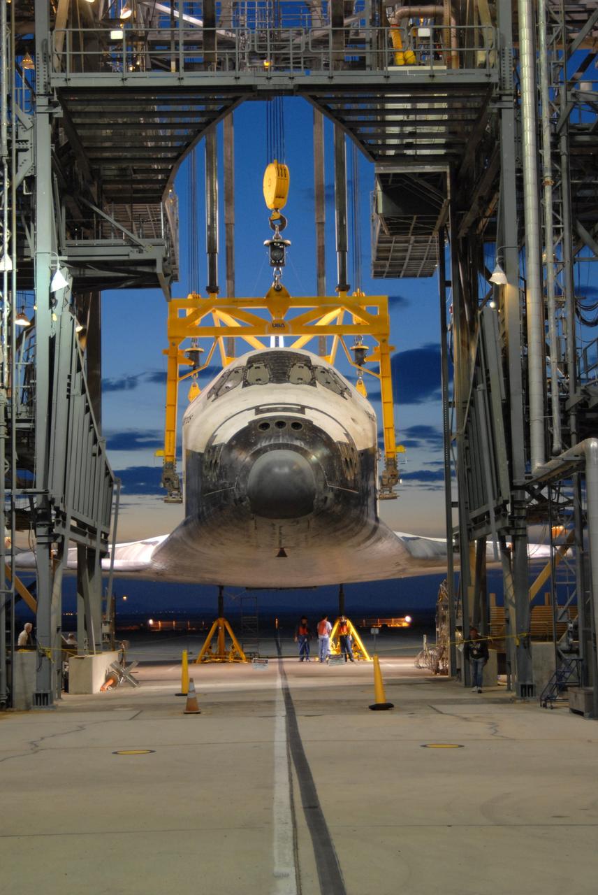 CAPE CANAVERAL, Fla. – At Edwards Air Force Base in California, a sling in the mate/demate device hoists space shuttle Atlantis from the ground. A Shuttle Carrier Aircraft, or SCA, will be moved underneath and Atlantis bolted to the top of the modified Boeing 747. Atlantis landed at Edwards on May 24, which concluded mission STS-125, after two landing opportunities at Kennedy were waved off due to weather concerns. Atlantis is being returned to Florida on a ferry flight on the SCA. Atlantis' next assignment is the STS-129 mission, targeted to launch in November 2009. Photo credit: NASA/Ben Smegelsky