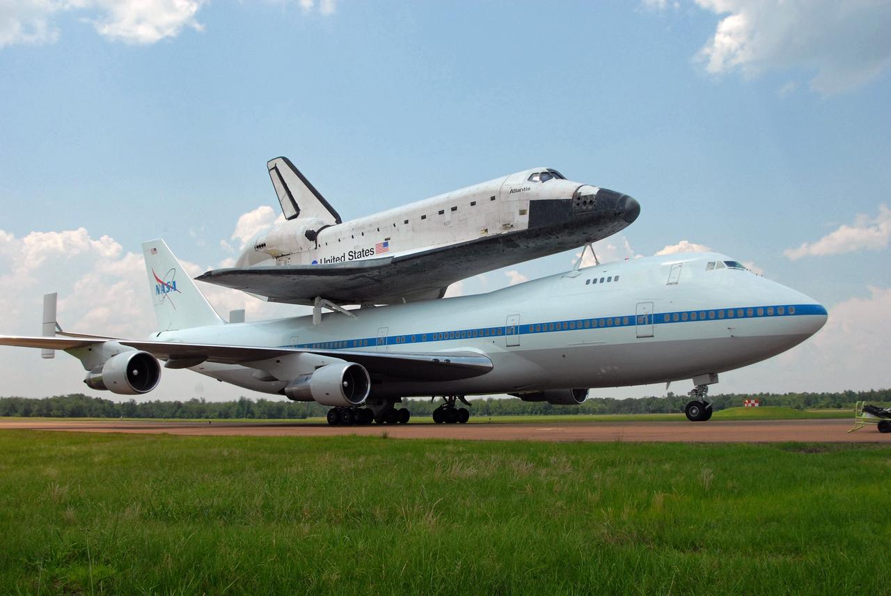 CAPE CANAVERAL, Fla. – Hitching a ride on the Shuttle Carrier Aircraft, or SCA, a modified Boeing 747, space shuttle Atlantis has landed at Columbus Air Force Base in Mississippi for a fuel stop on its journey back to Florida.  Atlantis' next assignment is the STS-129 mission, targeted to launch in November 2009.   Photo credit: NASA/Ben Smegelsky