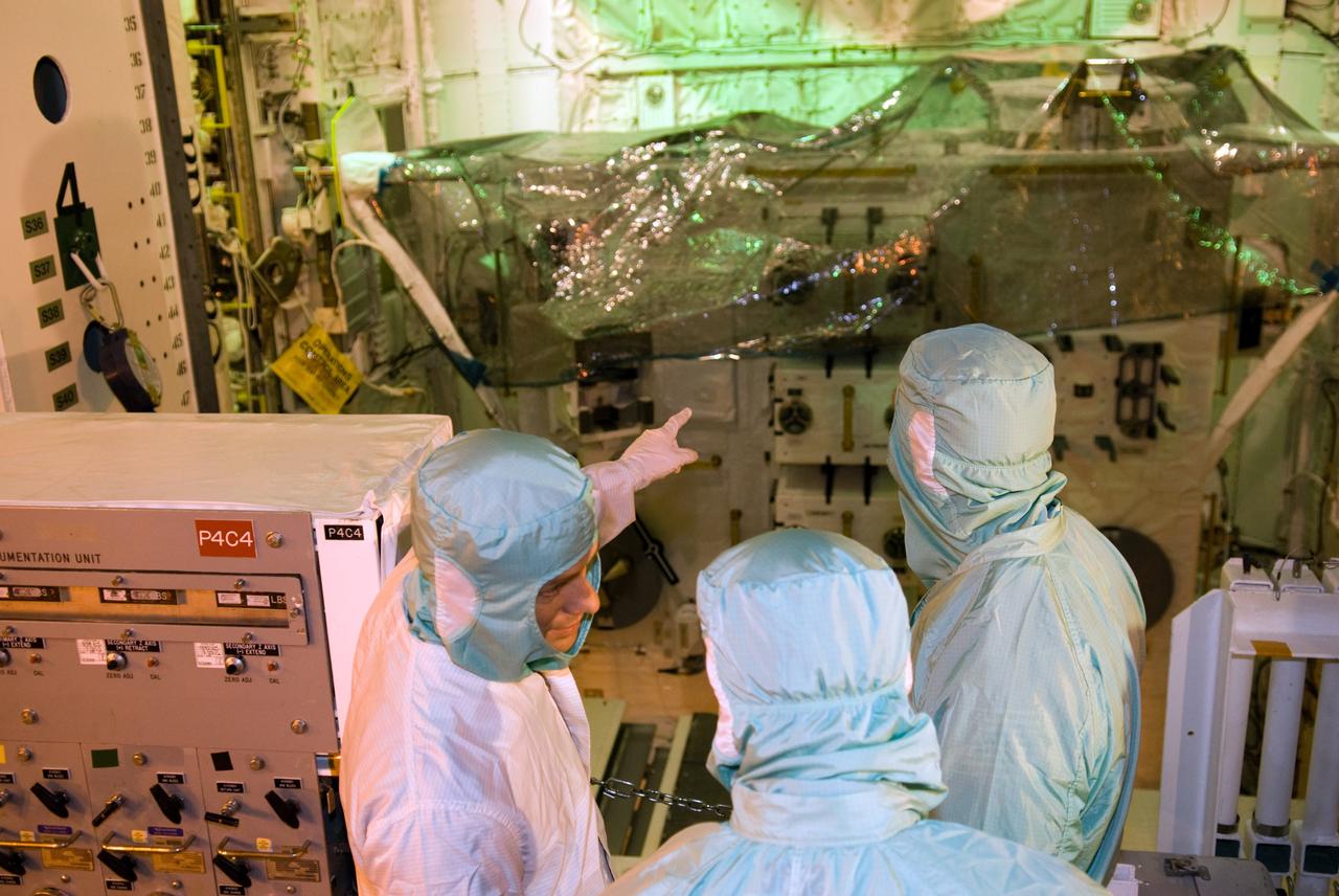 CAPE CANAVERAL, Fla. – On Launch Pad 39A at NASA's Kennedy Space Center in Florida, STS-127 crew members get a close look at the payload in space shuttle Endeavour's payload bay. The payload includes the Japanese Experiment Module's Exposed Facility, or JEM-EF and the Experiment Logistics Module-Exposed Section, or ELM-ES. The astronauts are at Kennedy to prepare for launch through Terminal Countdown Demonstration Test activities. The TCDT includes equipment familiarization and a simulated launch countdown. Endeavour's STS-127 mission is the final of three flights dedicated to the assembly of the Japanese Kibo laboratory complex on the International Space Station. Endeavour's launch is targeted for June 13. Photo credit: NASA/Kim Shiflett