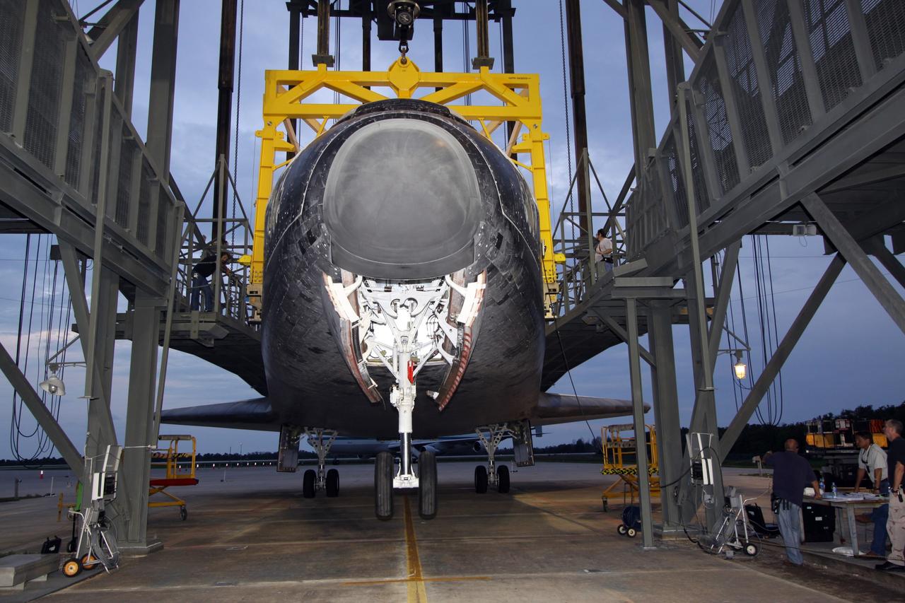 CAPE CANAVERAL, Fla. –  On the Shuttle Landing Facility at NASA's Kennedy Space Center in Florida, wheels are down on space shuttle Atlantis as it is prepared to be towed to Orbiter Processing Facility 1. After its May 24 landing at Edwards Air Force Base in California, which concluded its STS-125 mission, the modified Boeing 747 Shuttle Carrier Aircraft carried the shuttle on a two-day ferry flight from Edwards to Kennedy beginning June 1. Atlantis' next assignment is the STS-129 mission, targeted to launch in November 2009.  Photo credit: NASA/Jack Pfaller