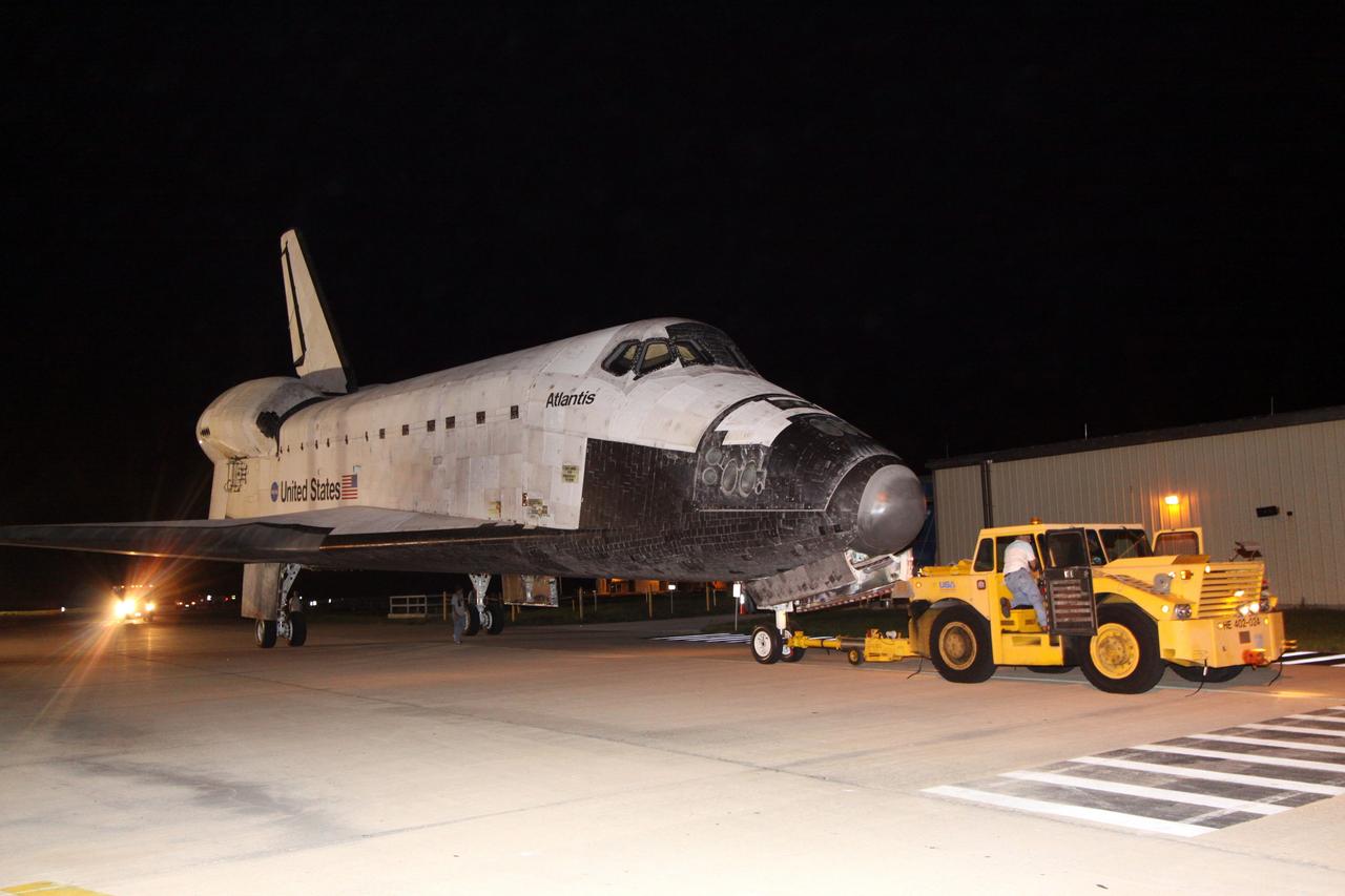 CAPE CANAVERAL, Fla. –  On the Shuttle Landing Facility at NASA's Kennedy Space Center in Florida, space shuttle Atlantis is moved away from the mate/demate device where it was separated from the Shuttle Carrier Aircraft, or SCA.  Atlantis will be towed to Orbiter Processing Facility 1.  After its May 24 landing at Edwards Air Force Base in California, which concluded its STS-125 mission, the modified Boeing 747 SCA carried the shuttle on a two-day ferry flight from Edwards to Kennedy beginning June 1. Atlantis' next assignment is the STS-129 mission, targeted to launch in November 2009.  Photo credit: NASA/Jack Pfaller