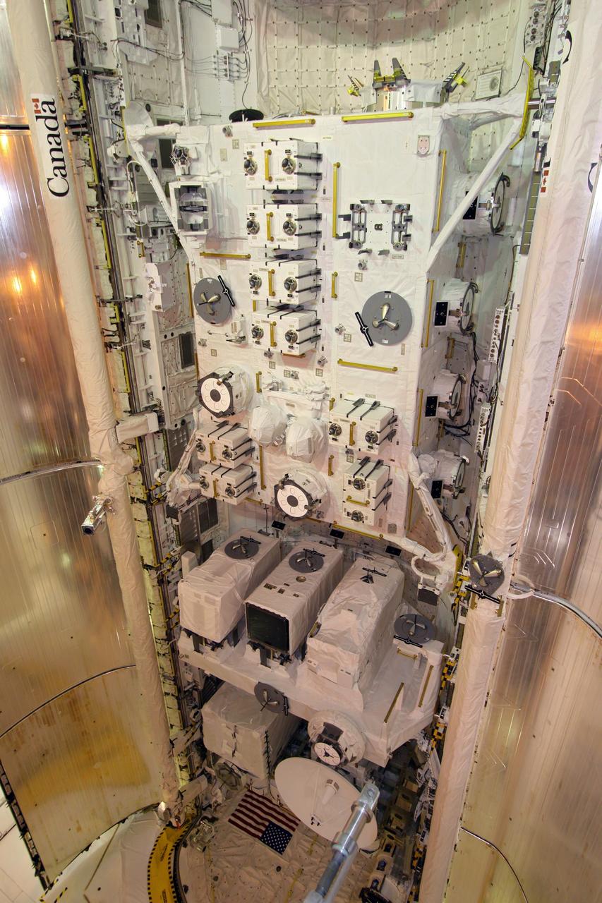 CAPE CANAVERAL, Fla. – On Launch Pad 39A at NASA's Kennedy Space Center in Florida, space shuttle Endeavour's payload bay doors are closing. At the bottom of the payload bay is the Integrated Cargo Carrier-Vertical Light Deploy (with the Space-to-Ground Antenna showing). In the middle is the Experiment Logistics Module-Exposed Section. At top is the Japanese Experiment Module's Exposed Facility. The STS-127 mission is the final of three flights dedicated to the assembly of the Japanese Kibo laboratory complex on the International Space Station. Photo credit: NASA/Jack Pfaller