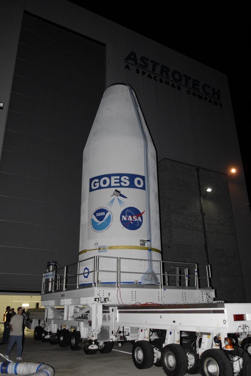 CAPE CANAVERAL, Fla. – At Cape Canaveral Air Force Station in Florida, the GOES-O satellite is being transported from the Astrotech payload processing facility in Titusville, Fla., to Launch Complex 37.  There it will be lifted into the mobile service tower and mated with the United Launch Alliance Delta IV expendable launch vehicle. The GOES-O satellite is targeted to launch no earlier than June 26. The latest Geostationary Operational Environmental Satellite, GOES-O was developed by NASA for the National Oceanic and Atmospheric Administration, or NOAA. The GOES satellites continuously provide observations of 60 percent of the Earth including the continental United States, providing weather monitoring and forecast operations as well as a continuous and reliable stream of environmental information and severe weather warnings. Once in orbit, GOES-O will be designated GOES-14, and NASA will provide on-orbit checkout and then transfer operational responsibility to NOAA.  Photo credit: NASA/Kim Shiflett