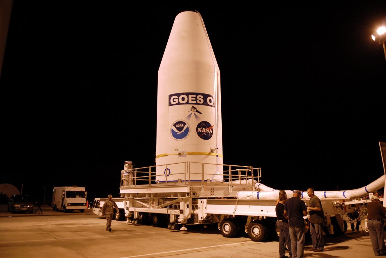 CAPE CANAVERAL, Fla. – At Cape Canaveral Air Force Station in Florida, the GOES-O satellite is being transported from the Astrotech payload processing facility in Titusville, Fla., to Launch Complex 37.  There it will be lifted into the mobile service tower and mated with the United Launch Alliance Delta IV expendable launch vehicle.  The GOES-O satellite is targeted to launch no earlier than June 26. The latest Geostationary Operational Environmental Satellite, GOES-O was developed by NASA for the National Oceanic and Atmospheric Administration, or NOAA. The GOES satellites continuously provide observations of 60 percent of the Earth including the continental United States, providing weather monitoring and forecast operations as well as a continuous and reliable stream of environmental information and severe weather warnings. Once in orbit, GOES-O will be designated GOES-14, and NASA will provide on-orbit checkout and then transfer operational responsibility to NOAA.  Photo credit: NASA/Kim Shiflett