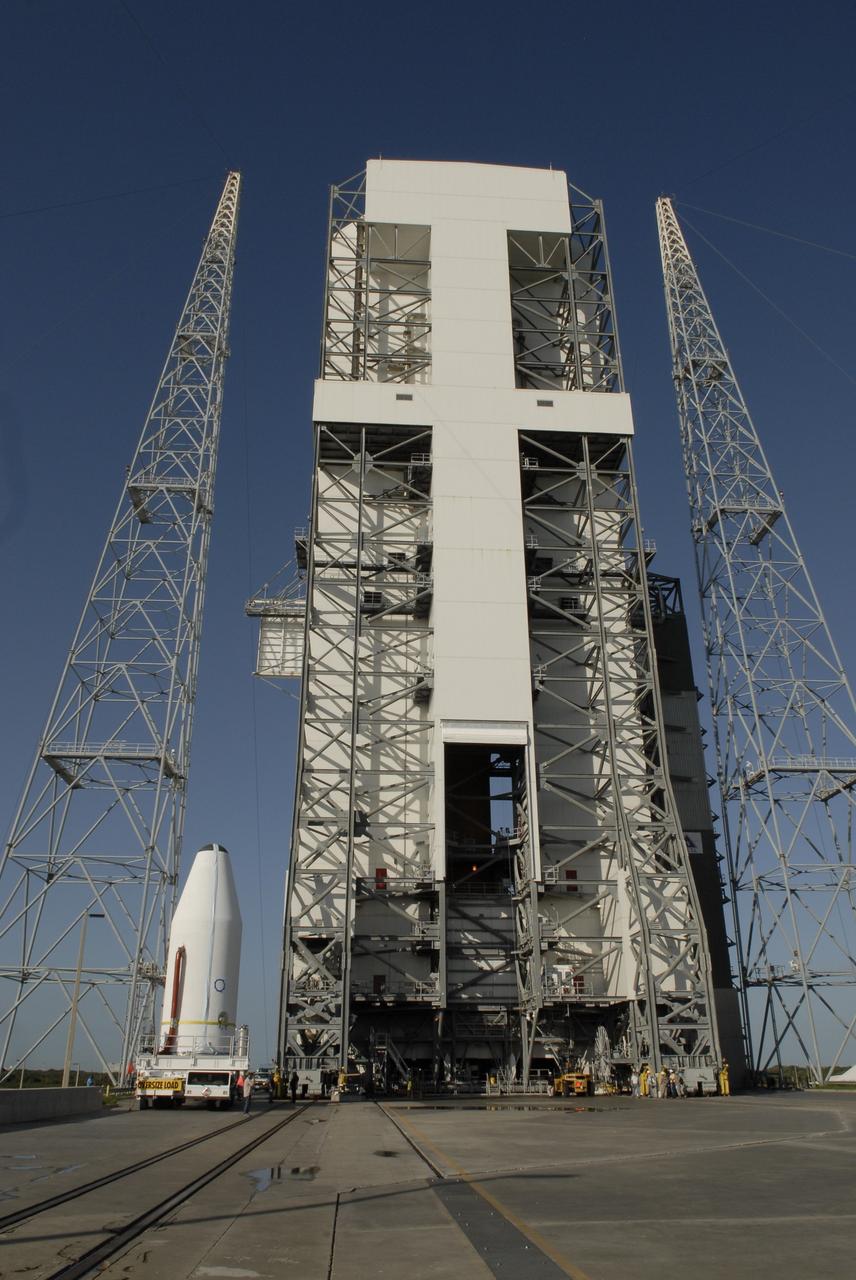 CAPE CANAVERAL, Fla. – At Cape Canaveral Air Force Station in Florida, the GOES-O satellite  arrives at mobile service tower on Launch Complex 37.  It will be lifted into the tower and mated with the United Launch Alliance Delta IV expendable launch vehicle. The GOES-O satellite is targeted to launch no earlier than June 26. The latest Geostationary Operational Environmental Satellite, GOES-O was developed by NASA for the National Oceanic and Atmospheric Administration, or NOAA. The GOES satellites continuously provide observations of 60 percent of the Earth including the continental United States, providing weather monitoring and forecast operations as well as a continuous and reliable stream of environmental information and severe weather warnings. Once in orbit, GOES-O will be designated GOES-14, and NASA will provide on-orbit checkout and then transfer operational responsibility to NOAA.  Photo credit: NASA/Kim Shiflett