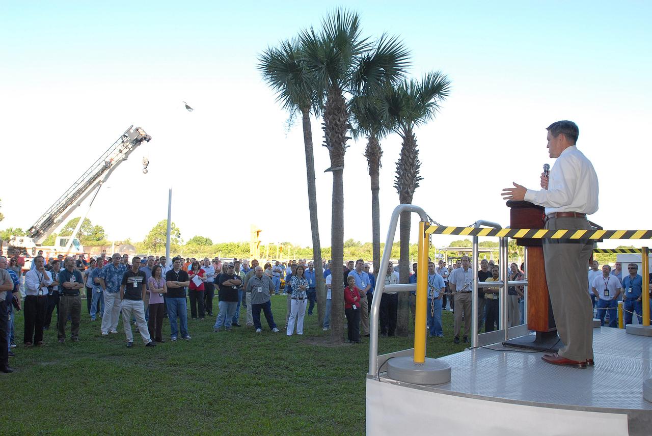 CAPE CANAVERAL, Fla. – Center Director Bob Cabana speaks to employees about the significance of moving the Ares I-X aft skirt from the Assembly and Refurbishment Facility at NASA's Kennedy Space Center to the Rotation, Processing and Surge Facility. The aft skirt underwent modifications in the ARF. In the RSPF, it will be stacked with the aft motor to form the aft assembly.  The complete Ares I-X will be assembled in the Vehicle Assembly Building. The launch of Ares I-X is targeted for August 2009. Photo credit: NASA/Jim Grossmann