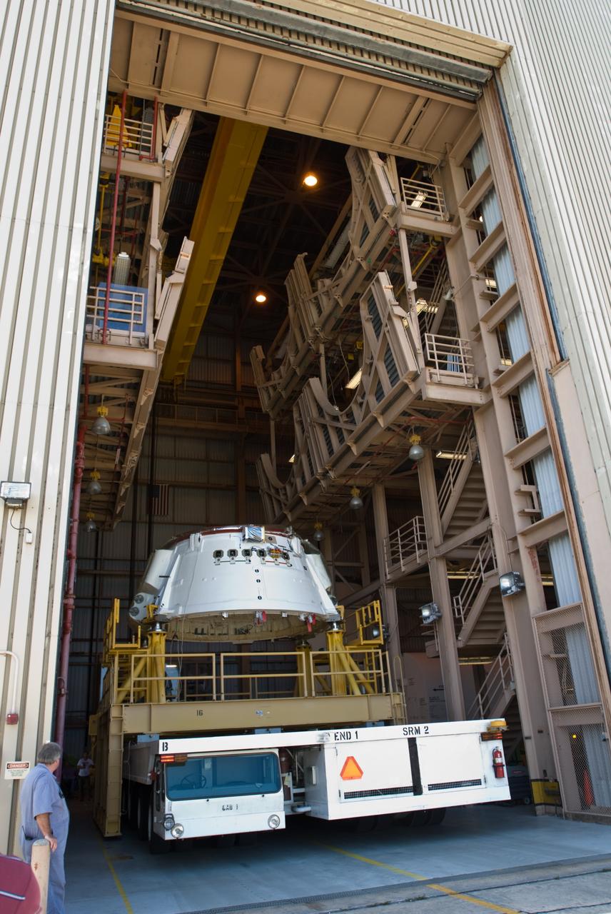 CAPE CANAVERAL, Fla. – The Ares I-X aft skirt moves inside the Rotation, Processing and Surge Facility at NASA's Kennedy Space Center in Florida.  In the RPSF, the aft skirt will be stacked with the aft motor to form the aft assembly.  The complete Ares I-X will be assembled in the Vehicle Assembly Building. The launch of Ares I-X is targeted for August 2009. Photo credit: NASA/Jim Grossmann