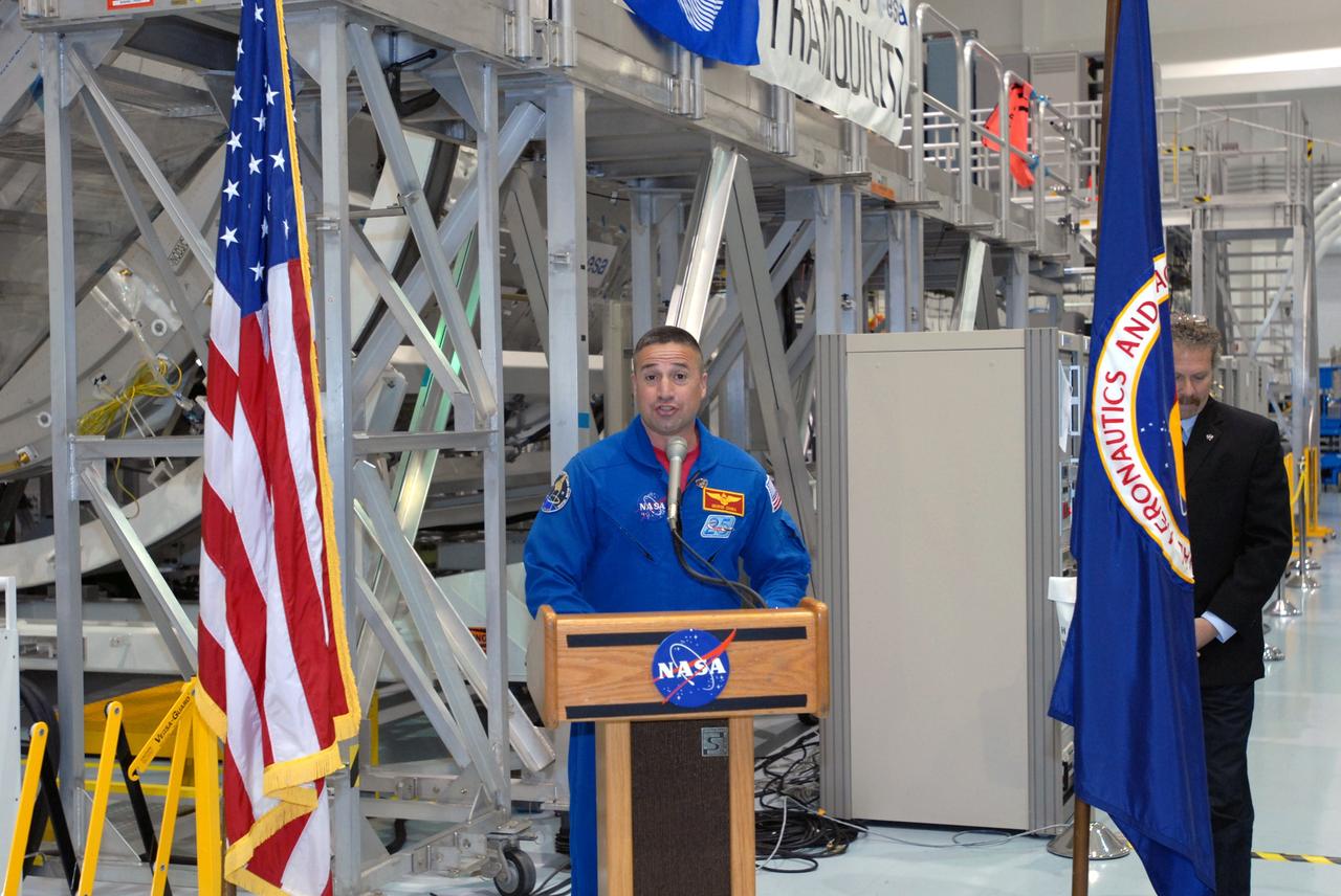 CAPE CANAVERAL, Fla. – During a media event at NASA's Kennedy Space Center in Florida to showcase the newest section of the International Space Station, the Tranquility node, STS-130 Commander George Zamka speaks to the media and guests. Tranquility will be delivered to the station during space shuttle Endeavour's STS-130 mission, targeted for launch in February 2010. At right is Russell Romanella, director of the ISS and Spacecraft Processing Directorate. Managers from NASA, the European Space Agency, Thales Alenia Space and Boeing -- the organizations involved in building and processing the module for flight -- were available for a question-and-answer session during the event. Tranquility is a pressurized module that will provide room for many of the station's life support systems. Photo credit: NASA/Jim Grossmann