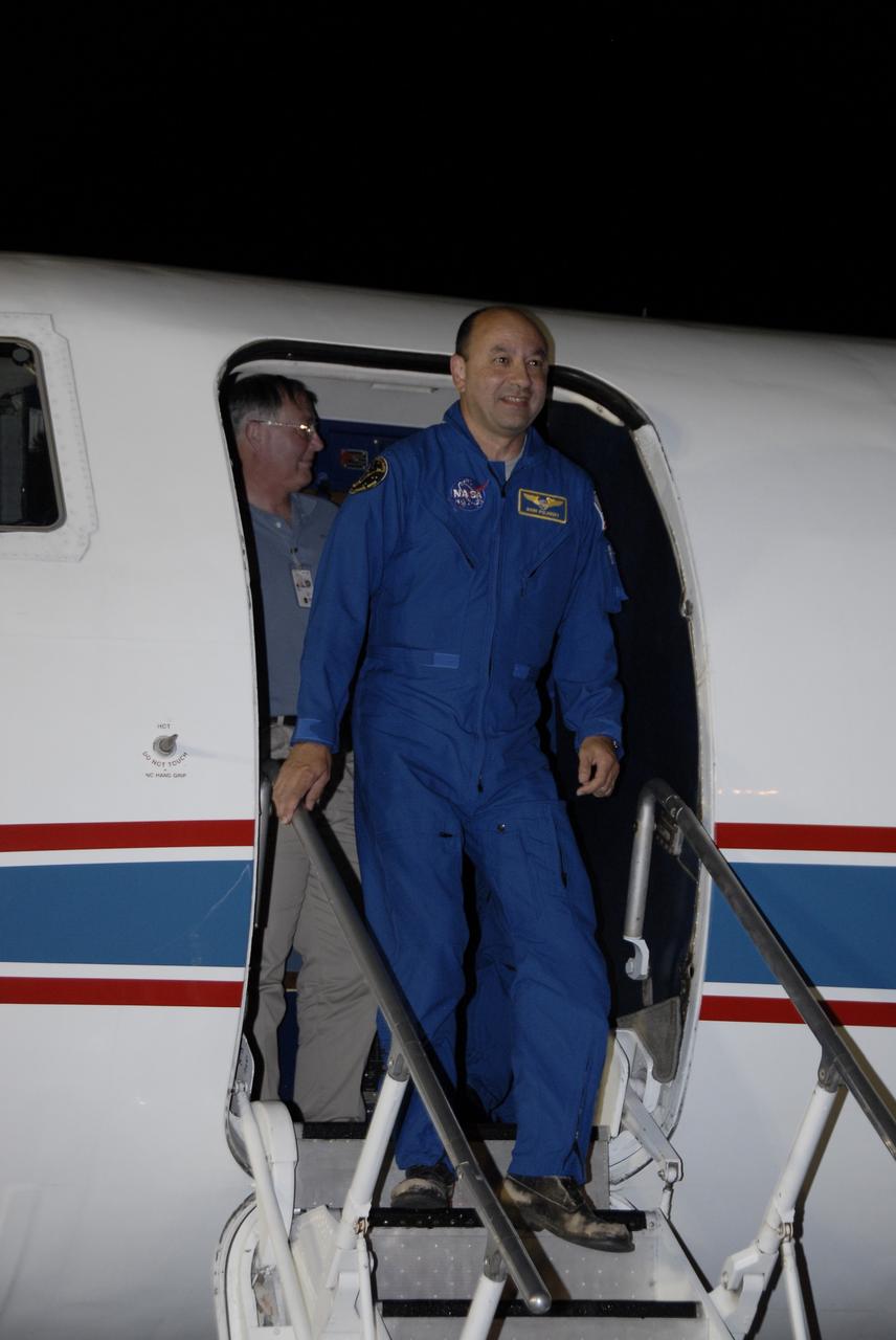 CAPE CANAVERAL, Fla. – STS-127 Commander Mark Polansky disembarks from a Shuttle Training Aircraft at the Shuttle Landing Facility at NASA's Kennedy Space Center in Florida. Polansky and the other members of the STS-127 crew arrived aboard the aircraft from Houston to get ready for launch on space shuttle Endeavour on June 13. Polansky will be making his third shuttle flight. The STS-127 mission is the final of three flights dedicated to the assembly of the Japan Aerospace Exploration Agency's Kibo laboratory complex on the International Space Station.  Endeavour will deliver the Japanese Experiment Module's Exposed Facility, or JEM-EF, and the Experiment Logistics Module-Exposed Section, or ELM-ES, to the space station on STS-127.  Photo credit: NASA/Kim Shiflett