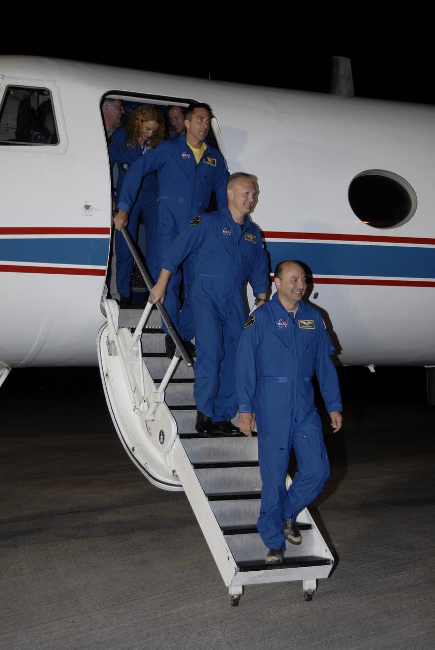 CAPE CANAVERAL, Fla. – Members of the STS-127 crew disembark from a Shuttle Training Aircraft at the Shuttle Landing Facility at NASA's Kennedy Space Center in Florida. From front to back are Commander Mark Polansky, Pilot Doug Hurley, and Mission Specialists Christopher Cassidy and Julie Payette of the Canadian Space Agency. The crew arrived aboard the aircraft from Houston to prepare for launch on space shuttle Endeavour on June 13. The STS-127 mission is the final of three flights dedicated to the assembly of the Japan Aerospace Exploration Agency's Kibo laboratory complex on the International Space Station.  Endeavour will deliver the Japanese Experiment Module's Exposed Facility, or JEM-EF, and the Experiment Logistics Module-Exposed Section, or ELM-ES, to the space station on STS-127.  Photo credit: NASA/Kim Shiflett