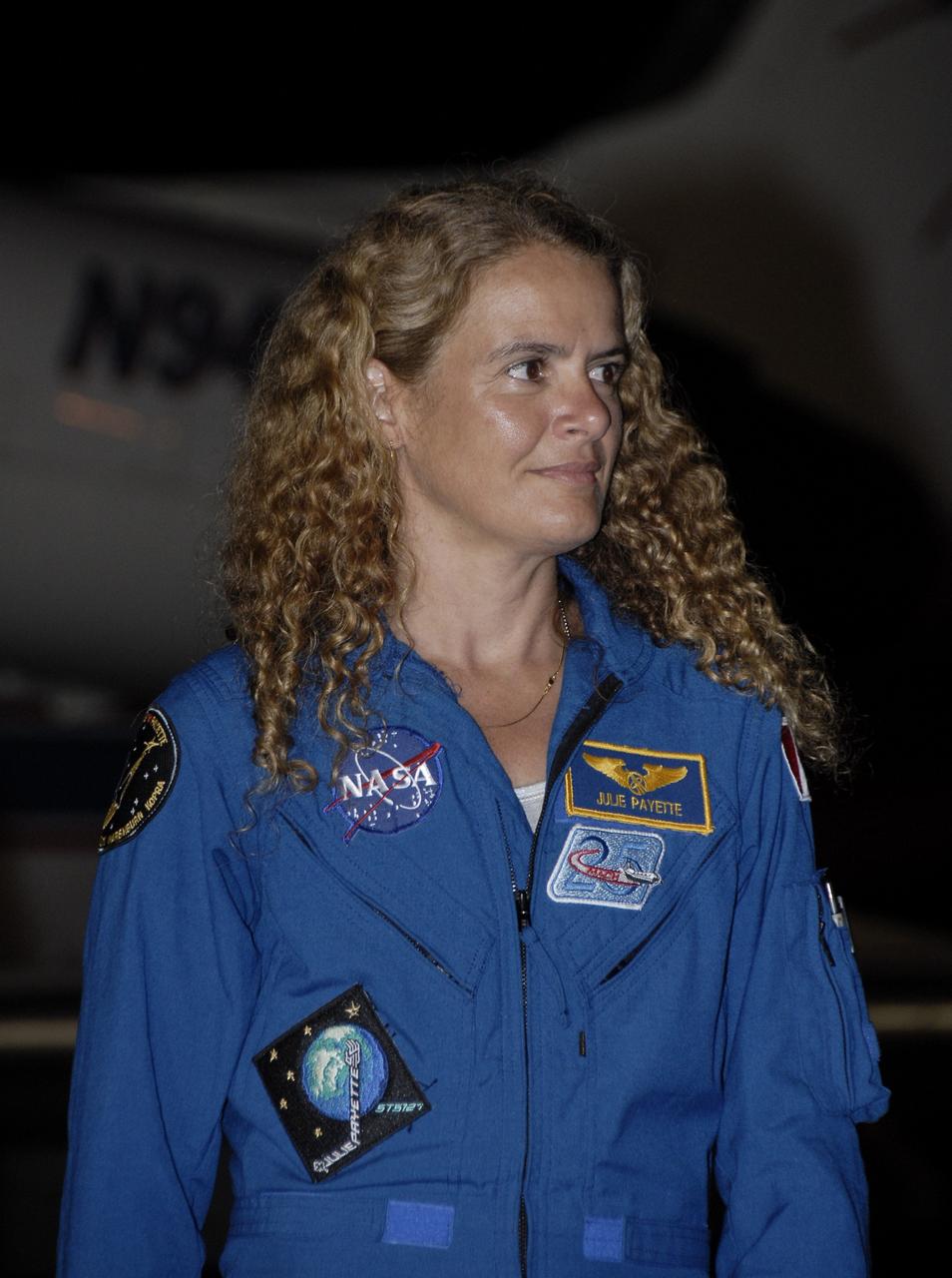 CAPE CANAVERAL, Fla. – At the Shuttle Landing Facility, STS-127 Mission Specialist Julie Payette is greeted by the media and others on hand to welcome the STS-127 crew to NASA's Kennedy Space Center in Florida. Payette and the other members of the crew arrived from Houston aboard a Shuttle Training Aircraft to get ready for launch on space shuttle Endeavour on June 13.  Payette represents the Canadian Space Agency and is making her second shuttle flight.  The STS-127 mission is the final of three flights dedicated to the assembly of the Japan Aerospace Exploration Agency's Kibo laboratory complex on the International Space Station.  Endeavour will deliver the Japanese Experiment Module's Exposed Facility, or JEM-EF, and the Experiment Logistics Module-Exposed Section, or ELM-ES, to the space station on STS-127.  Photo credit: NASA/Kim Shiflett