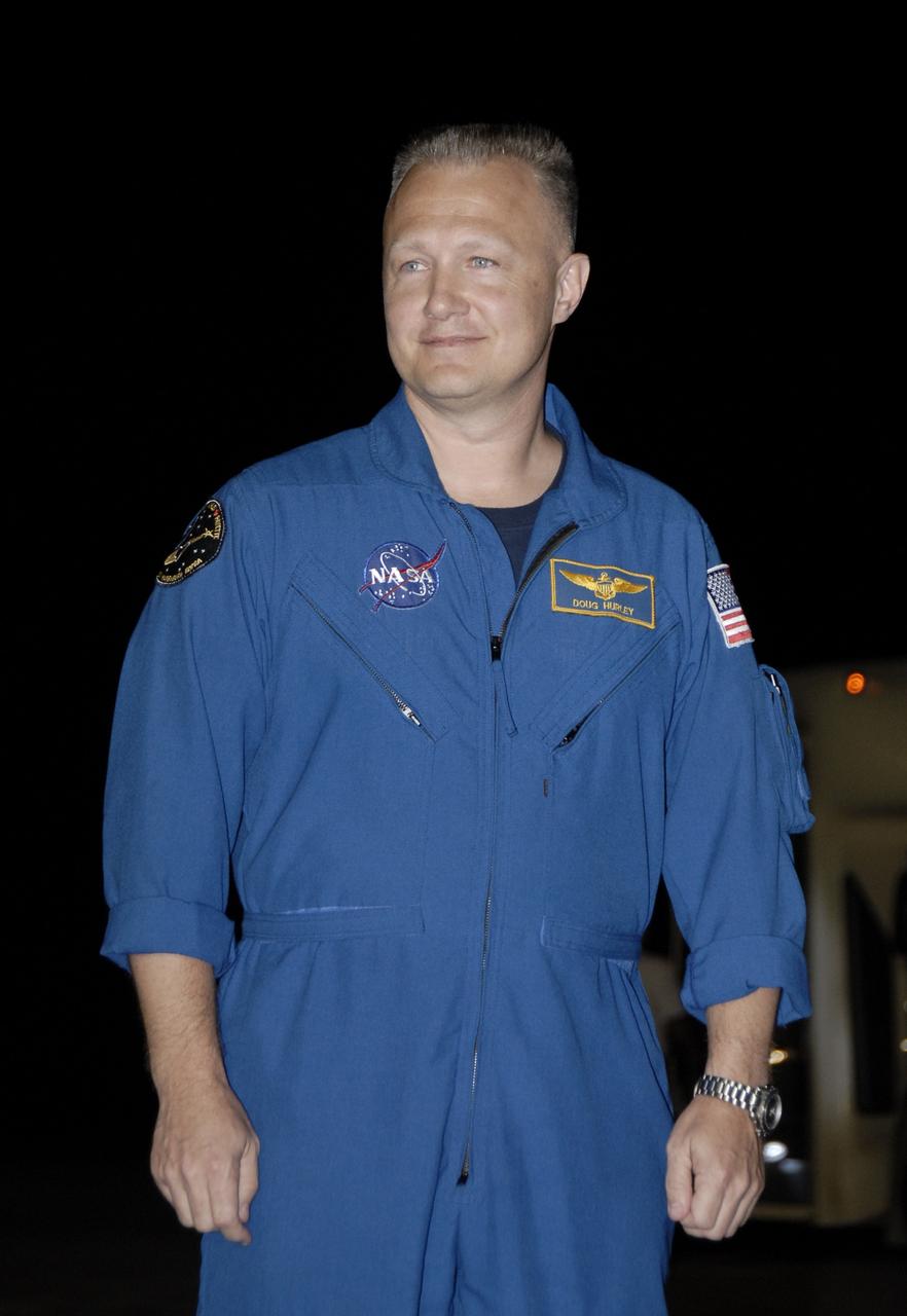 CAPE CANAVERAL, Fla. – At the Shuttle Landing Facility, STS-127 Pilot Doug Hurley is greeted by the media and others on hand to welcome the STS-127 crew to NASA's Kennedy Space Center in Florida. Hurley and the other members of the crew arrived from Houston aboard a Shuttle Training Aircraft to get ready for launch on space shuttle Endeavour on June 13.  Hurley, a lieutenant colonel in the U.S. Marine Corps, is making his first shuttle flight.  The STS-127 mission is the final of three flights dedicated to the assembly of the Japan Aerospace Exploration Agency's Kibo laboratory complex on the International Space Station.  Endeavour will deliver the Japanese Experiment Module's Exposed Facility, or JEM-EF, and the Experiment Logistics Module-Exposed Section, or ELM-ES, to the space station on STS-127.  Photo credit: NASA/Kim Shiflett