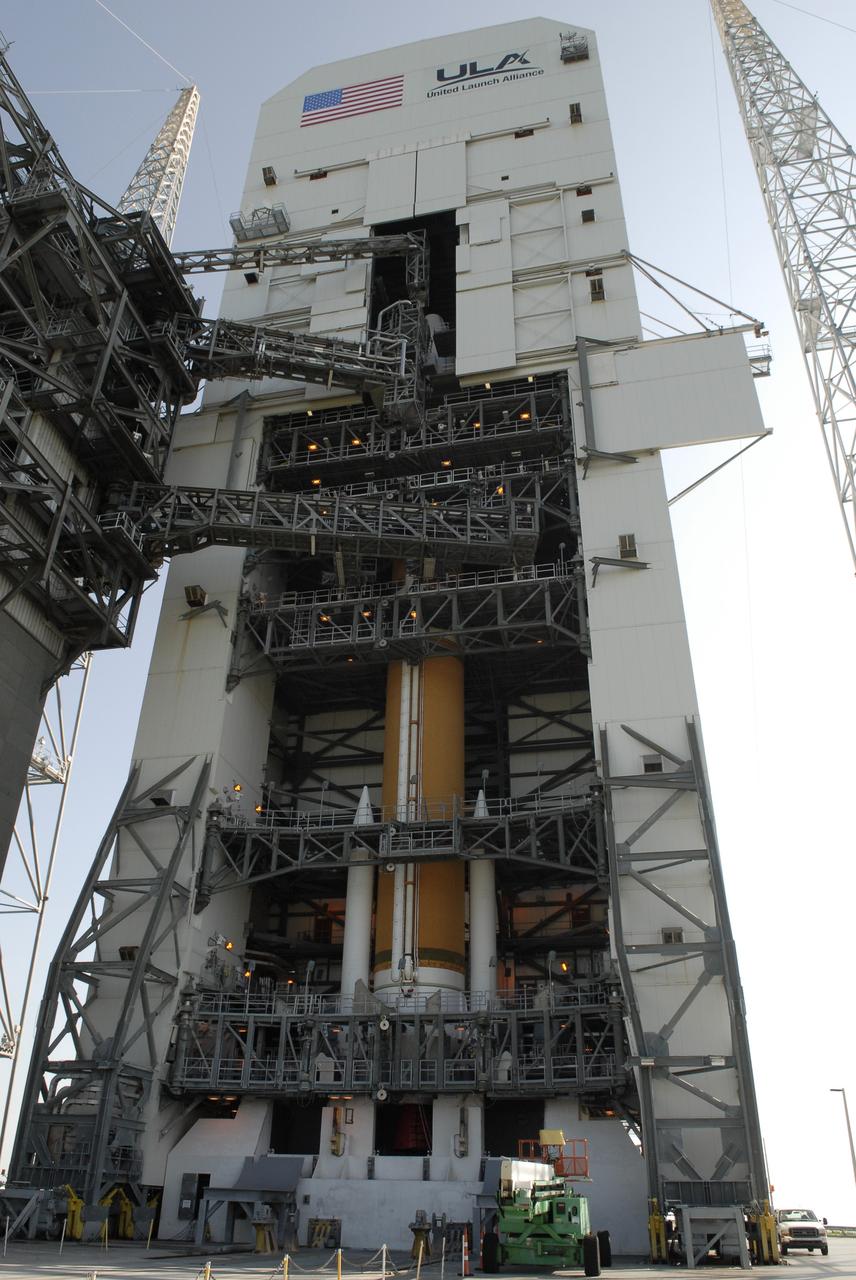 CAPE CANAVERAL, Fla. – On Launch Complex 37 at Cape Canaveral Air Force Station in Florida, the GOES-O satellite is seen in the top of the mobile service tower, where it has been mated with the United Launch Alliance Delta IV expendable launch vehicle below. The GOES-O satellite is targeted to launch June 26. The latest Geostationary Operational Environmental Satellite, GOES-O was developed by NASA for the National Oceanic and Atmospheric Administration, or NOAA. The GOES satellites continuously provide observations of 60 percent of the Earth including the continental United States, providing weather monitoring and forecast operations as well as a continuous and reliable stream of environmental information and severe weather warnings. Once in orbit, GOES-O will be designated GOES-14, and NASA will provide on-orbit checkout and then transfer operational responsibility to NOAA. Photo credit: NASA/Kim Shiflett