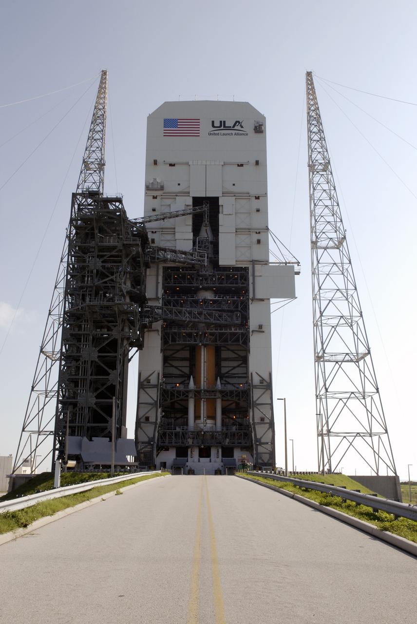 CAPE CANAVERAL, Fla. –  On Launch Complex 37 at Cape Canaveral Air Force Station in Florida, the GOES-O satellite is seen in the top of the mobile service tower, where it has been mated with the United Launch Alliance Delta IV expendable launch vehicle below. The GOES-O satellite is targeted to launch June 26. The latest Geostationary Operational Environmental Satellite, GOES-O was developed by NASA for the National Oceanic and Atmospheric Administration, or NOAA. The GOES satellites continuously provide observations of 60 percent of the Earth including the continental United States, providing weather monitoring and forecast operations as well as a continuous and reliable stream of environmental information and severe weather warnings. Once in orbit, GOES-O will be designated GOES-14, and NASA will provide on-orbit checkout and then transfer operational responsibility to NOAA.   Photo credit: NASA/Kim Shiflett