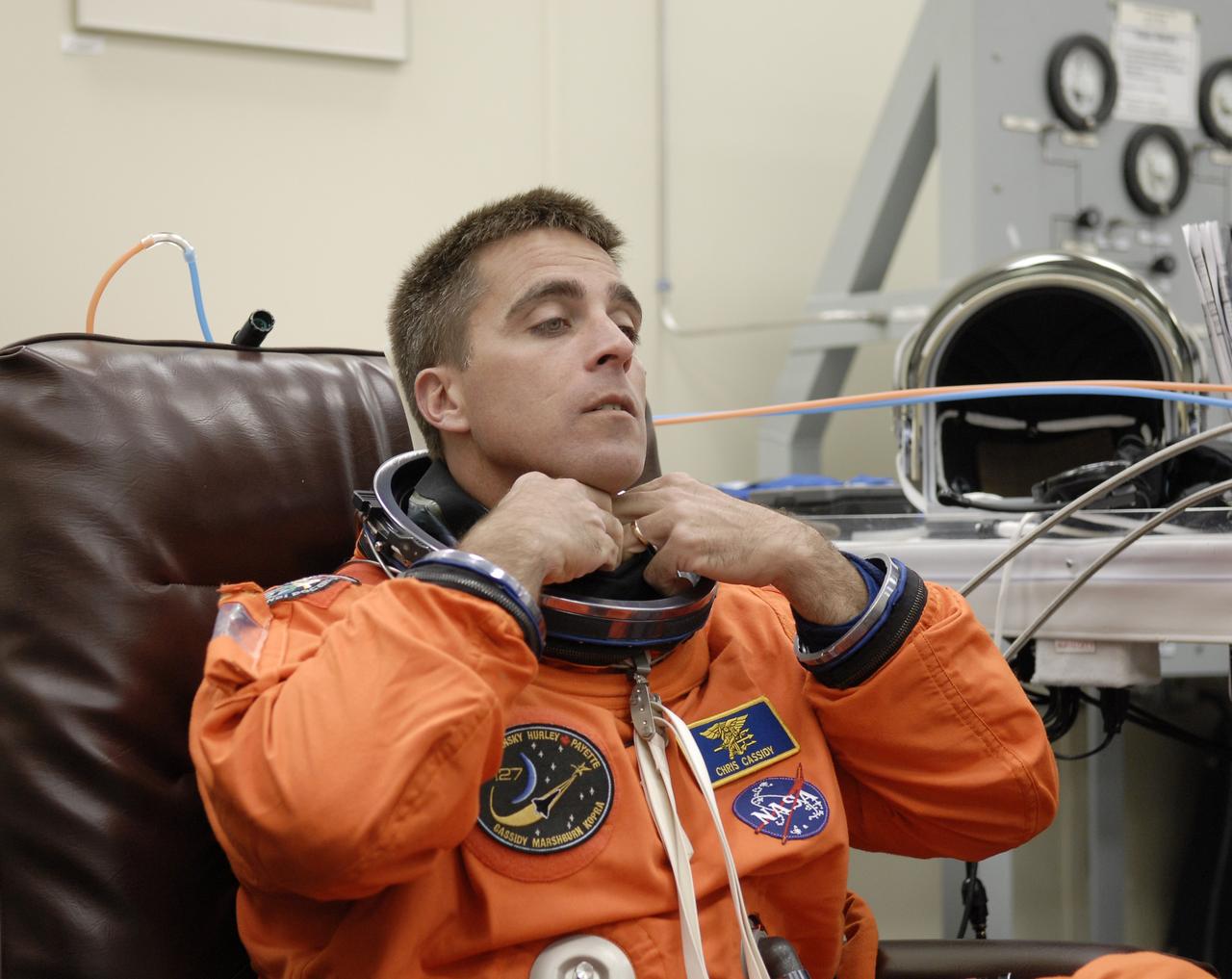 CAPE CANAVERAL, Fla. –  At NASA's Kennedy Space Center in Florida, STS-127 Mission Specialist Christopher Cassidy is checking the fit of his launch-and-entry suit in preparation for space shuttle Endeavour's launch on June 13 to the International Space Station.  Cassidy will be making his first shuttle flight.  Endeavour will deliver the Japanese Experiment Module's Exposed Facility, or JEM-EF, and the Experiment Logistics Module-Exposed Section, or ELM-ES, on STS-127. The mission is the final of three flights dedicated to the assembly of the Japan Aerospace Exploration Agency's Kibo laboratory complex on the space station.   Photo credit: NASA/Kim Shiflett