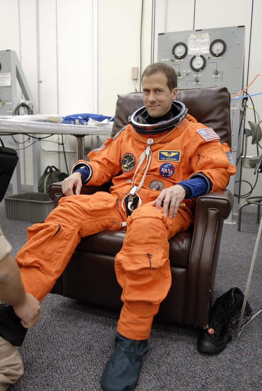 CAPE CANAVERAL, Fla. –  At NASA's Kennedy Space Center in Florida, STS-127 Mission Specialist Tom Marshburn is undergoing fit-check of his launch-and-entry suit in preparation for space shuttle Endeavour's launch on June 13 to the International Space Station.  Marshburn will be making his first shuttle flight. Endeavour will deliver the Japanese Experiment Module's Exposed Facility, or JEM-EF, and the Experiment Logistics Module-Exposed Section, or ELM-ES, on STS-127. The mission is the final of three flights dedicated to the assembly of the Japan Aerospace Exploration Agency's Kibo laboratory complex on the space station.   Photo credit: NASA/Kim Shiflett