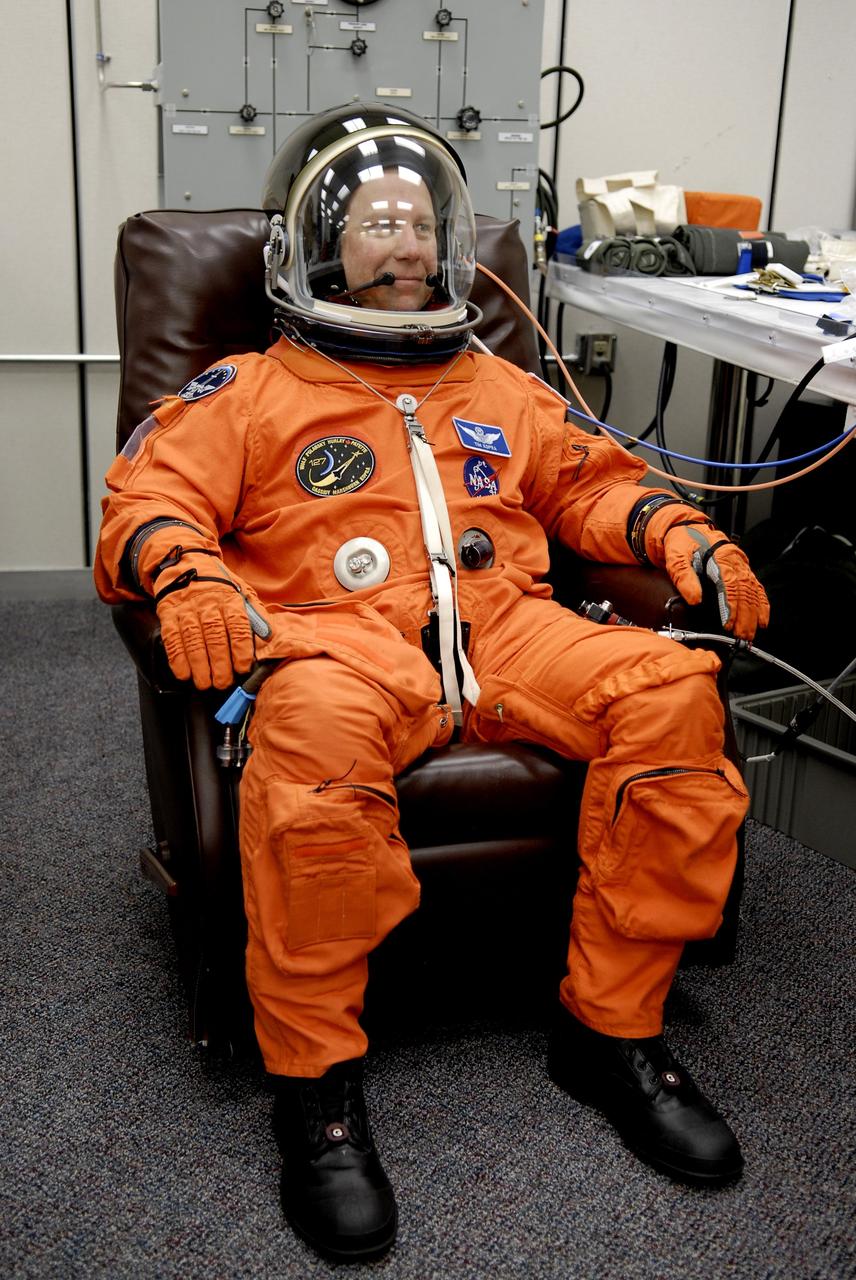 CAPE CANAVERAL, Fla. –  At NASA's Kennedy Space Center in Florida, STS-127 Mission Specialist Tim Kopra completes fit-check of his launch-and-entry suit in preparation for space shuttle Endeavour's launch on June 13 to the International Space Station.  Kopra will be making his first shuttle flight and will remain on the space station as the Expedition 20 flight engineer. He will return to Earth on space shuttle Discovery with the STS-128 crew.  Endeavour will deliver the Japanese Experiment Module's Exposed Facility, or JEM-EF, and the Experiment Logistics Module-Exposed Section, or ELM-ES, on STS-127. The mission is the final of three flights dedicated to the assembly of the Japan Aerospace Exploration Agency's Kibo laboratory complex on the space station.   Photo credit: NASA/Kim Shiflett