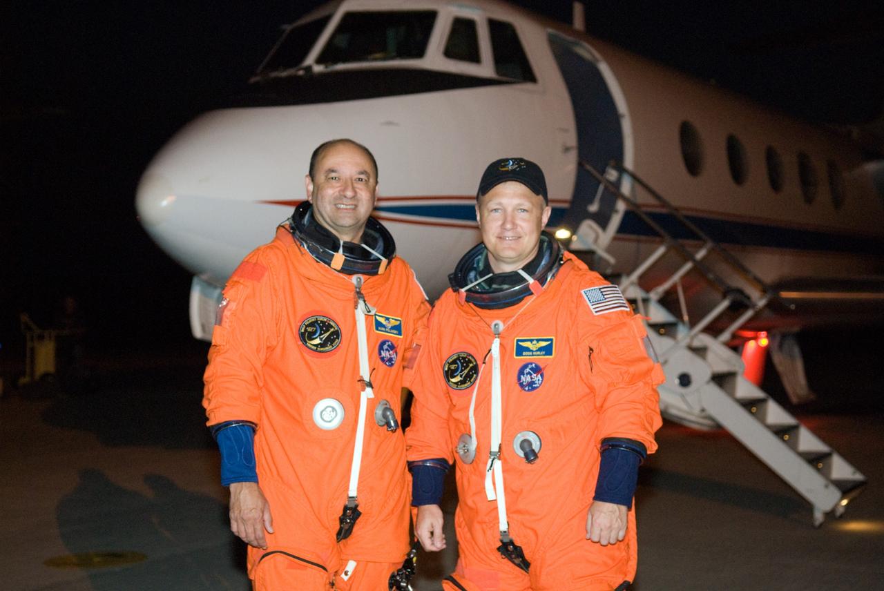 CAPE CANAVERAL, Fla. –  At the Shuttle Landing Facility at NASA's Kennedy Space Center in Florida, STS-127 Commander Mark Polansky and Pilot Doug Hurley are ready to begin practicing landings in the Shuttle Training Aircraft.  They are practicing in preparation for launch of space shuttle Endeavour on the STS-127 mission on June 13 to the International Space Station.  The STA is a Grumman American Aviation-built Gulfstream II jet that was modified to simulate a shuttle’s cockpit, motion and visual cues, and handling qualities. Endeavour will deliver the Japanese Experiment Module's Exposed Facility, or JEM-EF, and the Experiment Logistics Module-Exposed Section, or ELM-ES. on STS-127. The mission is the final of three flights dedicated to the assembly of the Japan Aerospace Exploration Agency's Kibo laboratory complex on the space station.    Photo credit: NASA/Kim Shiflett
