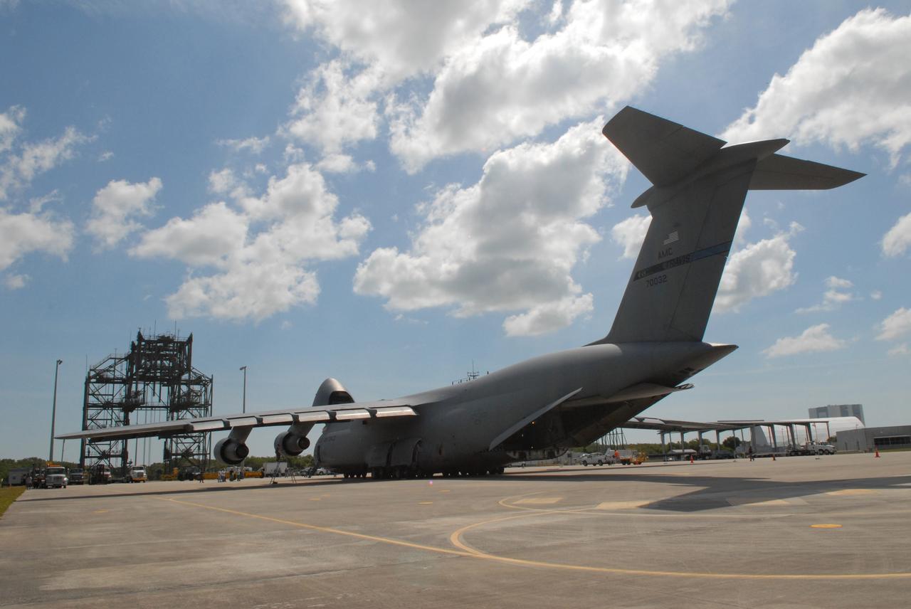 CAPE CANAVERAL, Fla. –  The U.S. Air Force C-17 aircraft arrives at NASA Kennedy Space Center's Shuttle Landing Facility with its cargo of the STSS Demonstrator SV-2 spacecraft.  The spacecraft will be transferred to the Astrotech payload processing facility in Titusville, Fla. The spacecraft is a midcourse tracking technology demonstrator, part of an evolving ballistic missile defense system. STSS is capable of tracking objects after boost phase and provides trajectory information to other sensors. It will be launched by NASA for the Missile Defense Agency in late summer.  Photo credit: NASA/Jack Pfaller  (Approved for Public Release 09-MDA-4616 [27 May 09])