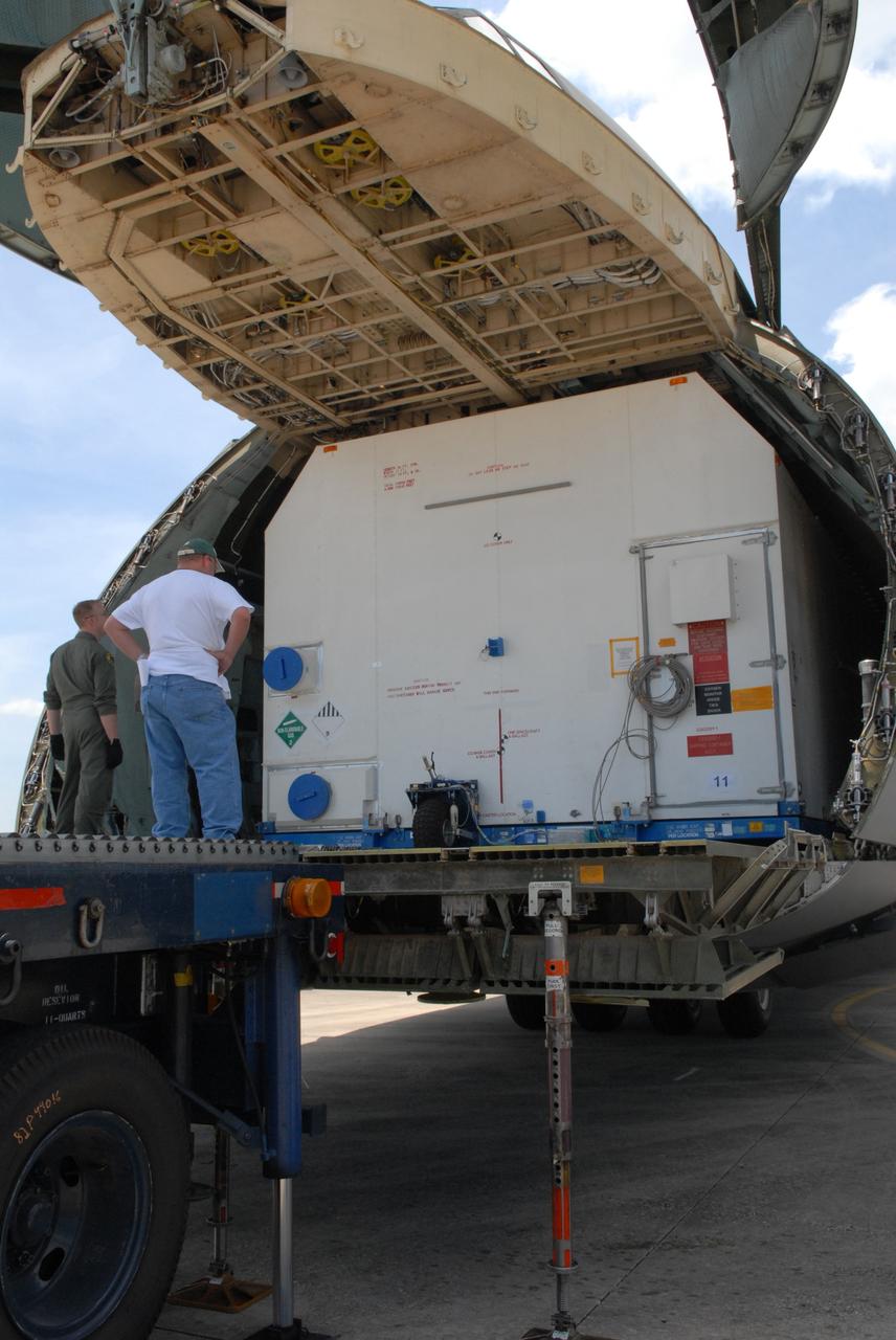 CAPE CANAVERAL, Fla. –  At NASA Kennedy Space Center's Shuttle Landing Facility,  the shipping container with the STSS Demonstrator SV-2spacecraft waits to be offloaded from the U.S. Air Force C-17 aircraft. The spacecraft will be transferred to the Astrotech payload processing facility in Titusville, Fla. The spacecraft is a midcourse tracking technology demonstrator, part of an evolving ballistic missile defense system. STSS is capable of tracking objects after boost phase and provides trajectory information to other sensors. It will be launched by NASA for the Missile Defense Agency in late summer.  Photo credit: NASA/Jack Pfaller  (Approved for Public Release 09-MDA-4616 [27 May 09])
