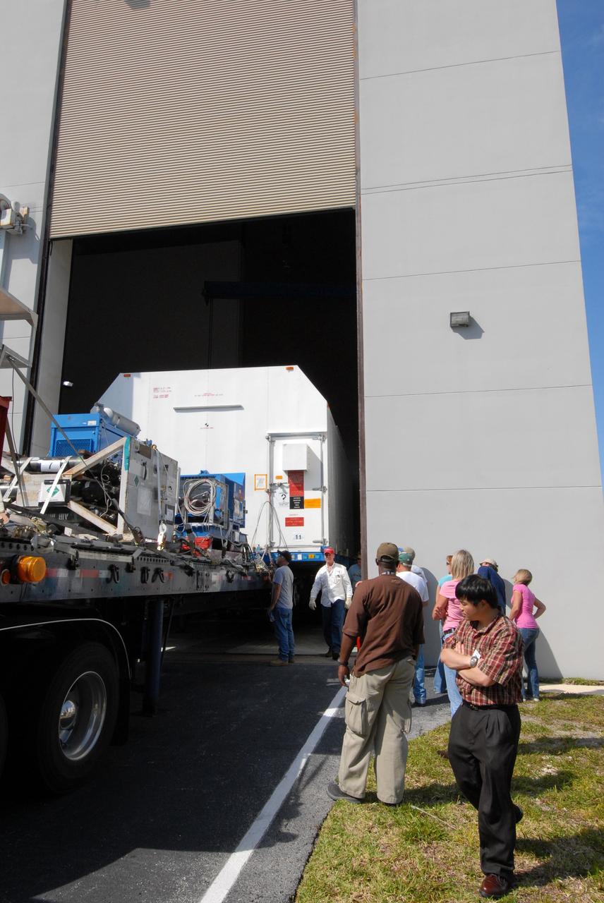 CAPE CANAVERAL, Fla. –  The STSS Demonstrator SV-2spacecraft is moved inside a building at the Astrotech payload processing facility in Titusville, Fla.  The spacecraft is a midcourse tracking technology demonstrator, part of an evolving ballistic missile defense system. STSS is capable of tracking objects after boost phase and provides trajectory information to other sensors. It will be launched by NASA for the Missile Defense Agency in late summer.  Photo credit: NASA/Jack Pfaller  (Approved for Public Release 09-MDA-4616 [27 May 09])