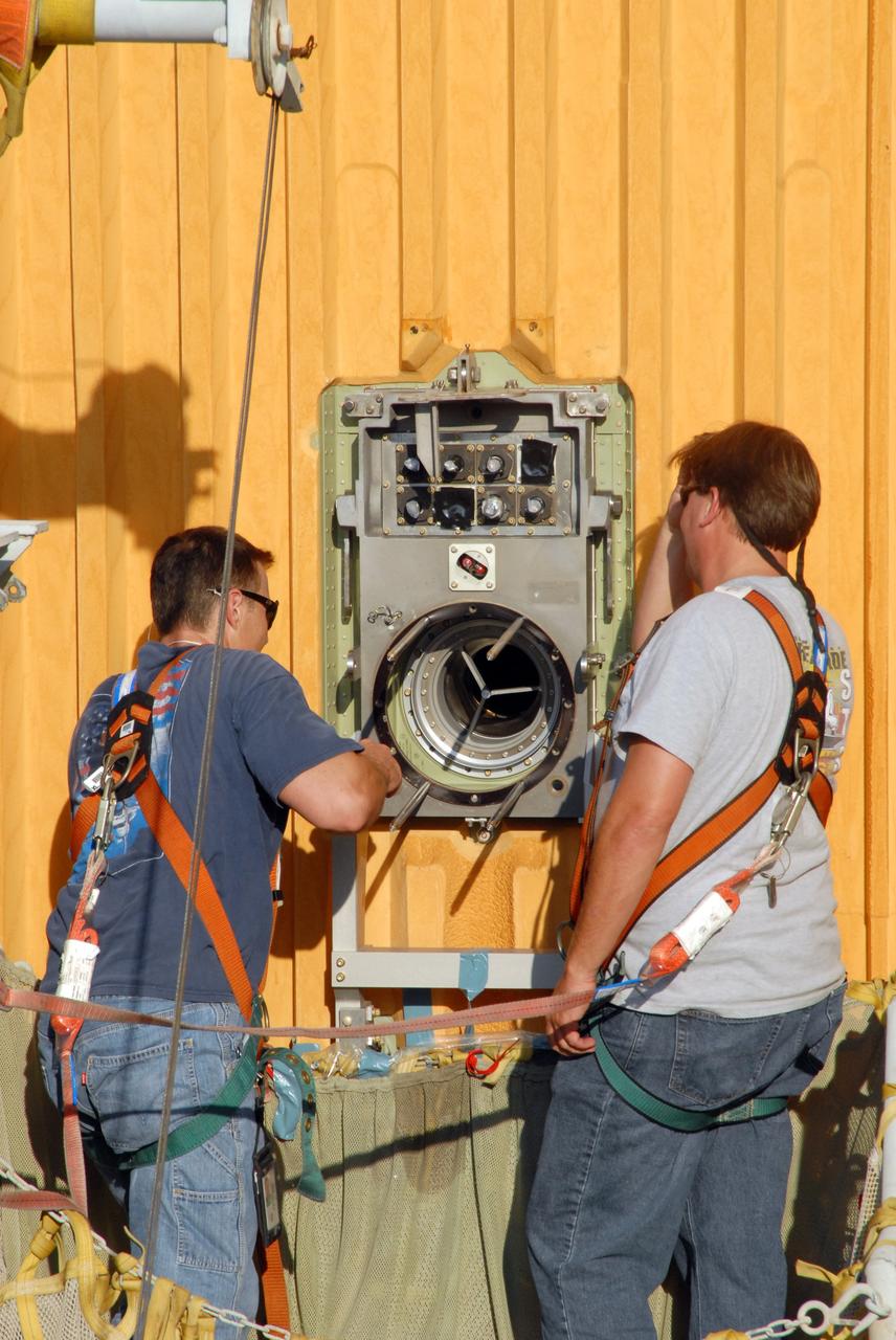 CAPE CANAVERAL, Fla. – Seen in the photo is the 7-inch quick disconnect that will be repaired on the hydrogen vent line to the Ground Umbilical Carrier Plate on space shuttle Endeavour's external fuel tank on Launch Pad 39A at NASA's Kennedy Space Center in Florida. Teams are removing the hardware to change out seals in the internal connection points. A leak of hydrogen at the location during tanking June 12 for the STS-127 mission caused the mission to be scrubbed at 12:26 a.m. June 13. The GUCP is the overboard vent to the pad and the flare stack where the vented hydrogen is burned off. Endeavour is scheduled to launch on its STS-127 mission on June 17 at 5:40 a.m. EDT. Photo credit: NASA/Tim Jacobs