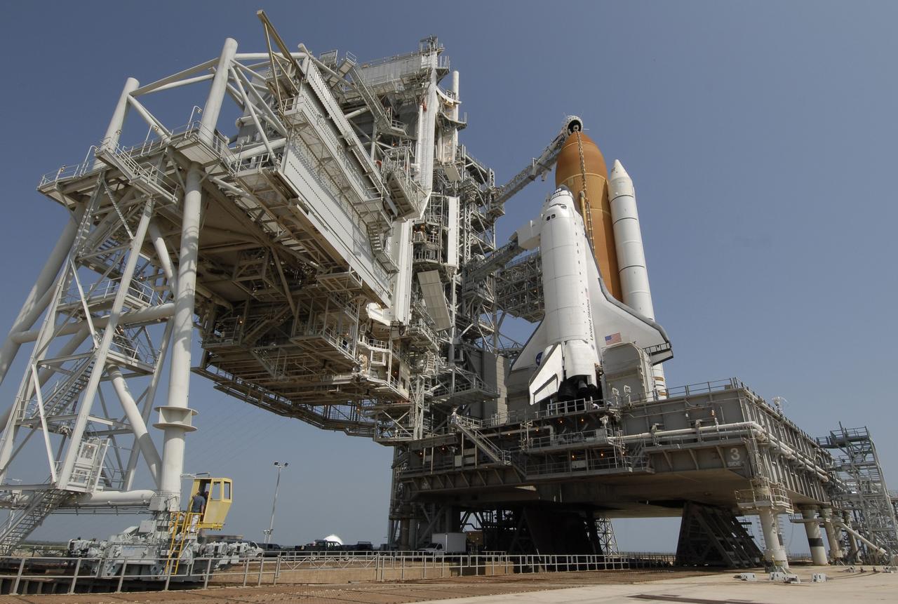 CAPE CANAVERAL, Fla. –  On Launch Pad 39A at NASA's Kennedy Space Center in Florida, the rotating service structure, or RSS, at left is rolled away from space shuttle Endeavour. First motion was at 10:15 a.m. EDT. The rollback is in preparation for Endeavour's liftoff on the STS-127 mission with a crew of seven.  This is the second launch attempt for Endeavour after the June 13 launch was scrubbed due to a hydrogen leak at the Ground Umbilical Carrier Plate during tanking June 12.  The launch will be Endeavour's 23rd flight. The shuttle will carry the Japanese Experiment Module's Exposed Facility, or JEM-EF, and the Experiment Logistics Module-Exposed Section, or ELM-ES, on STS-127. The mission is the final of three flights dedicated to the assembly of the Japan Aerospace Exploration Agency's Kibo laboratory complex on the space station. Endeavour's launch is scheduled for June 17 at 5:40 a.m. EDT.  Photo credit: NASA/Kim Shiflett