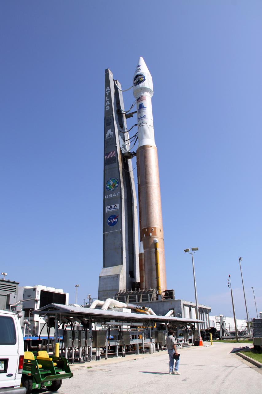 CAPE CANAVERAL, Fla. –   On Launch Complex-41 on Cape Canaveral Air Force Station in Florida, NASA's Lunar Reconnaissance Orbiter, or LRO, and NASA's Lunar Crater Observation and Sensing Satellite, known as LCROSS, and launch gantry roll out to the launch pad.  They are atop their launch vehicle, the Atlas V/Centaur rocket.  LRO and LCROSS are the first missions in NASA's plan to return humans to the moon and begin establishing a lunar outpost by 2020. The LRO also includes seven instruments that will help NASA characterize the moon's surface:  DIVINER, LAMP, LEND, LOLA, CRATER, Mini-RF and LROC.  Launch is scheduled for 5:22 p.m. EDT June 18 . Photo credit: NASA/Jack Pfaller